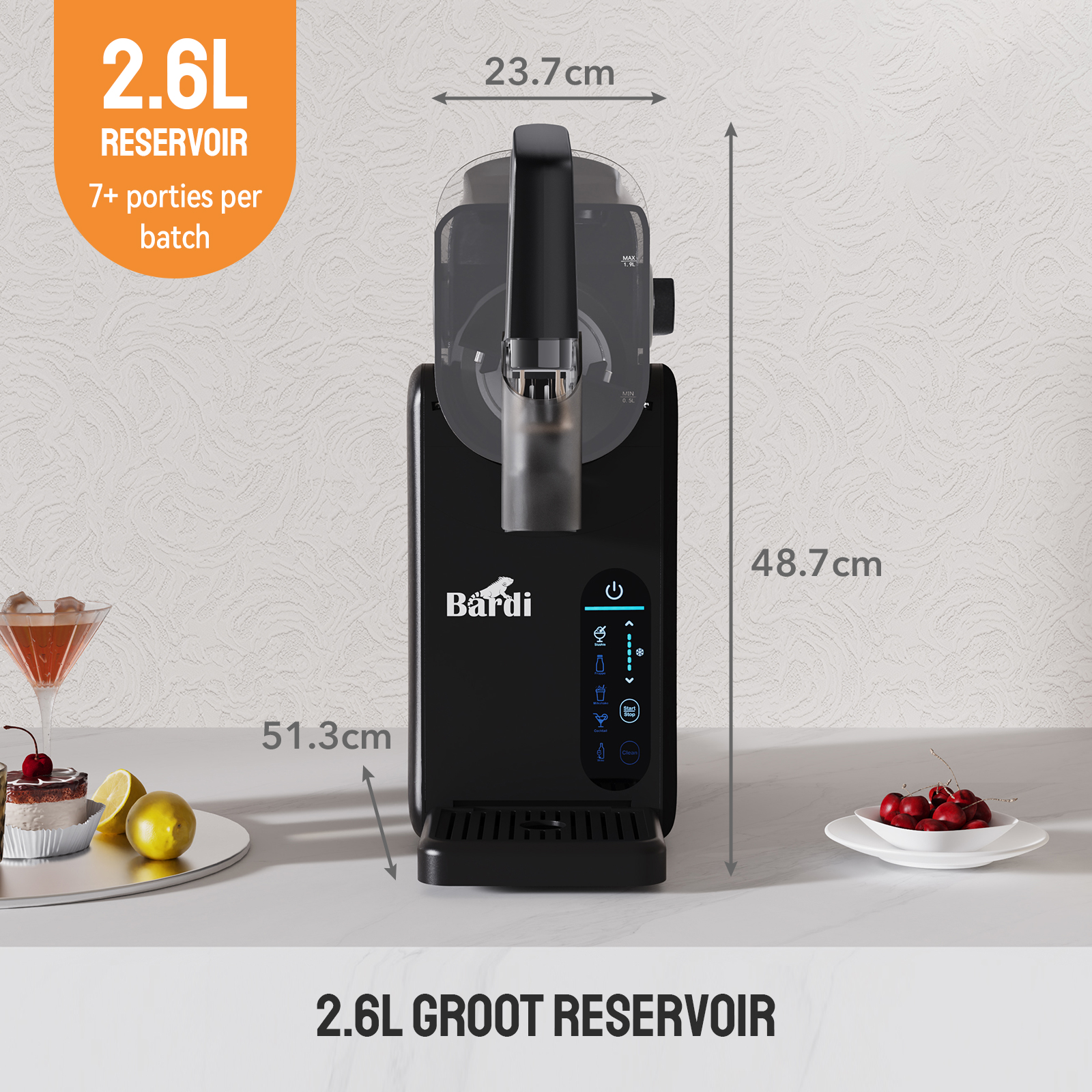 A black appliance with dimensions labeled. On the side are drinks and fruit. Text says '2.6L reservoir'.
