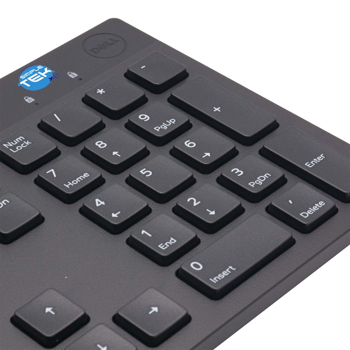 Zbliżenie czarnej klawiatury Dell z klawiaturą numeryczną. Widoczne są cyfry, symbole i klawisze funkcyjne. Logo Dell znajduje się u góry.