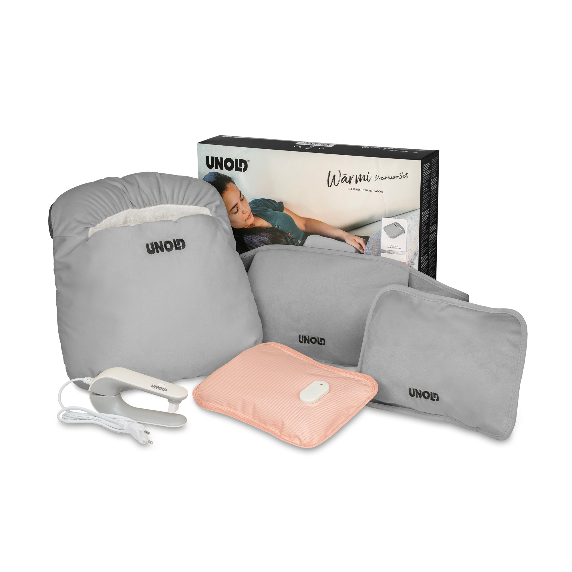 Ein graues Unold-Heizkissen-Set enthält ein großes Pad, kleine Pads und ein rosa Pad mit einer Fernbedienung. Eine Box befindet sich im Hintergrund.