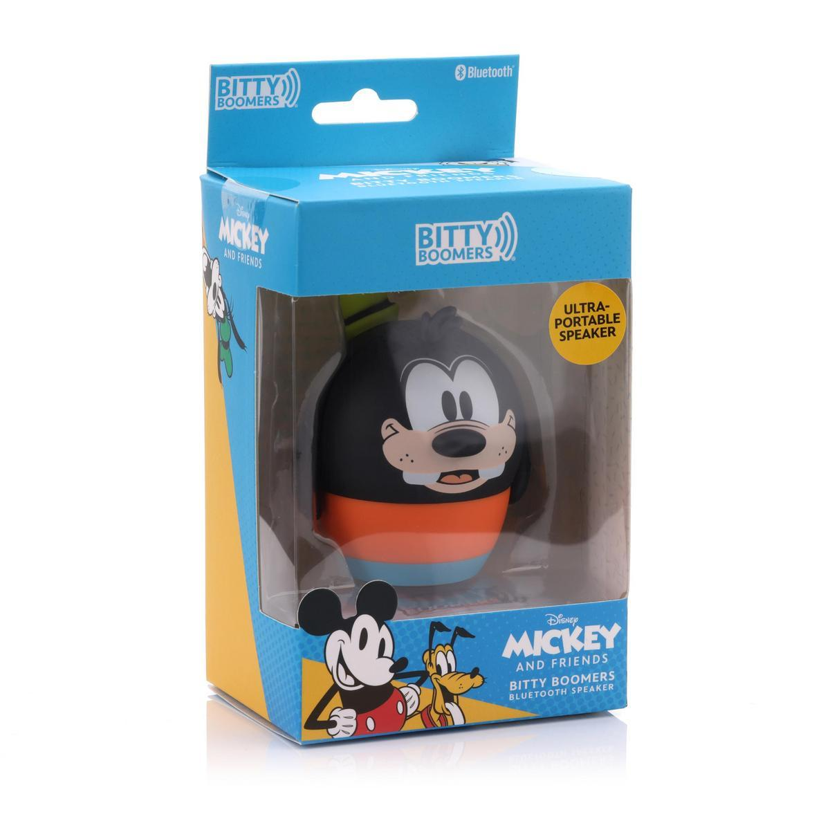 Een Mickey and Friends Bitty Boomers speaker in een doos. Hij is zwart, oranje en blauw. De doos heeft Mickey Mouse en Goofy erop.