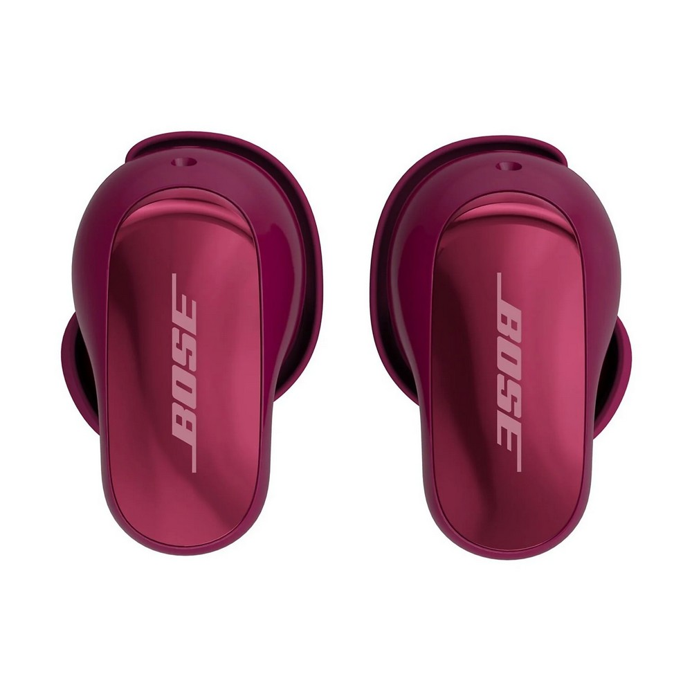 Dos auriculares Bose granates. Cada auricular tiene el logotipo de Bose. Están sobre un fondo blanco.