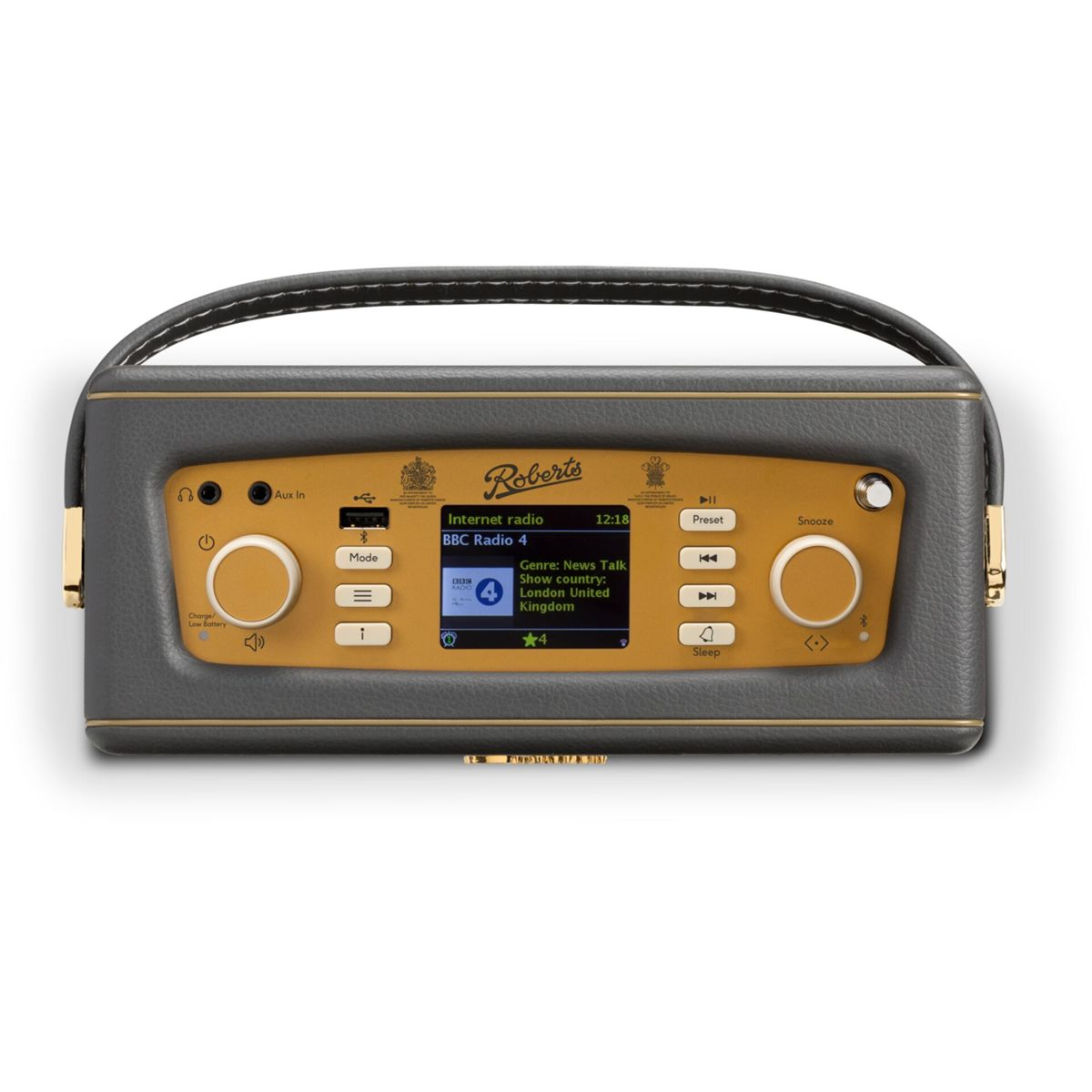 Radio Roberts. Szara obudowa ze złotymi akcentami, ekran z napisem 'BBC Radio 4'. Ma przyciski i uchwyt. Tło jest białe.