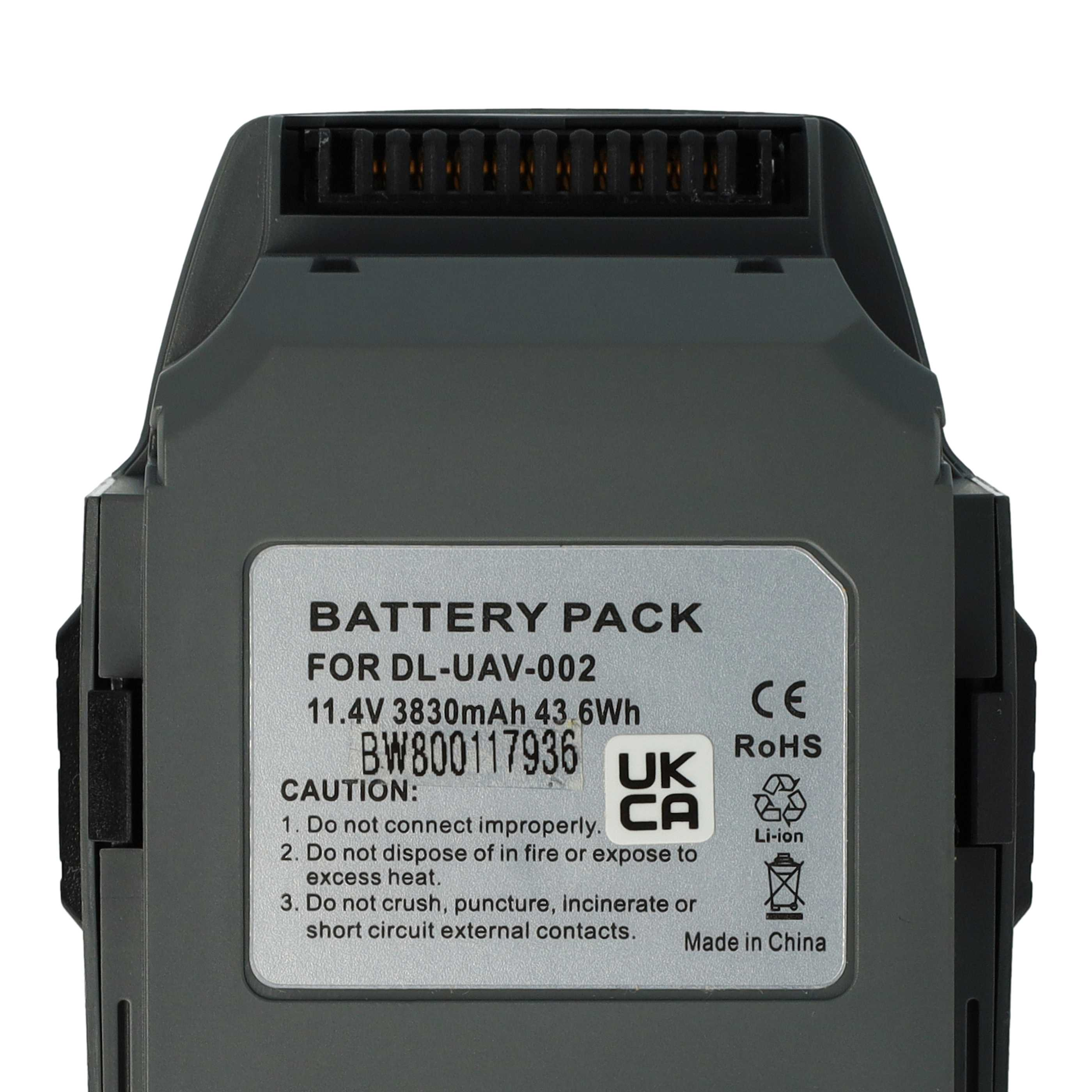 Grauer Akku mit Etikett. Das Etikett lautet 'BATTERY PACK', '11.4V' und andere Warnhinweise.