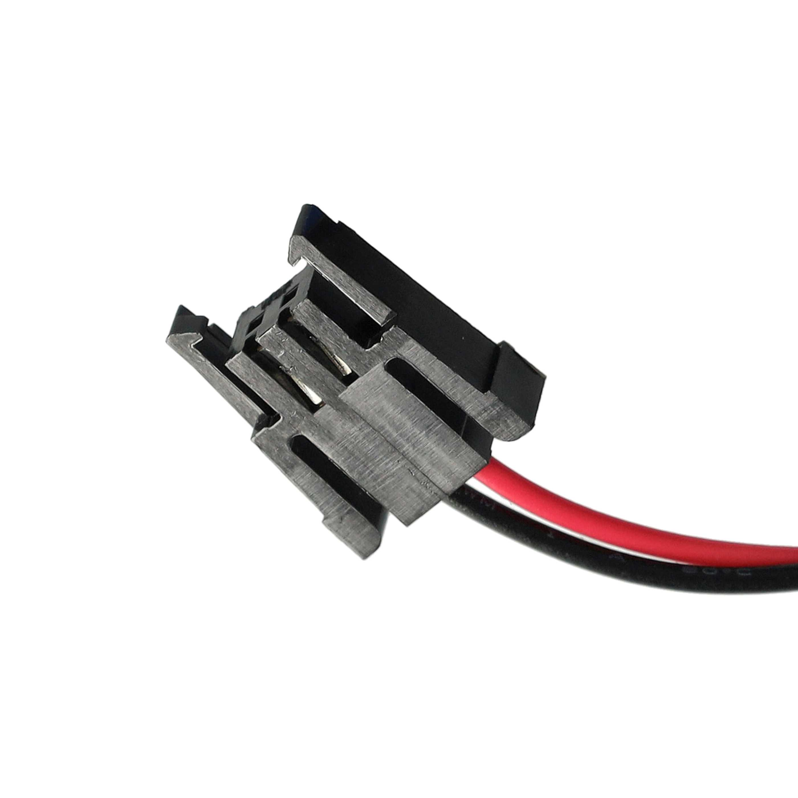 Ein schwarzer und grauer elektrischer Stecker mit roten und schwarzen Drähten vor weißem Hintergrund.