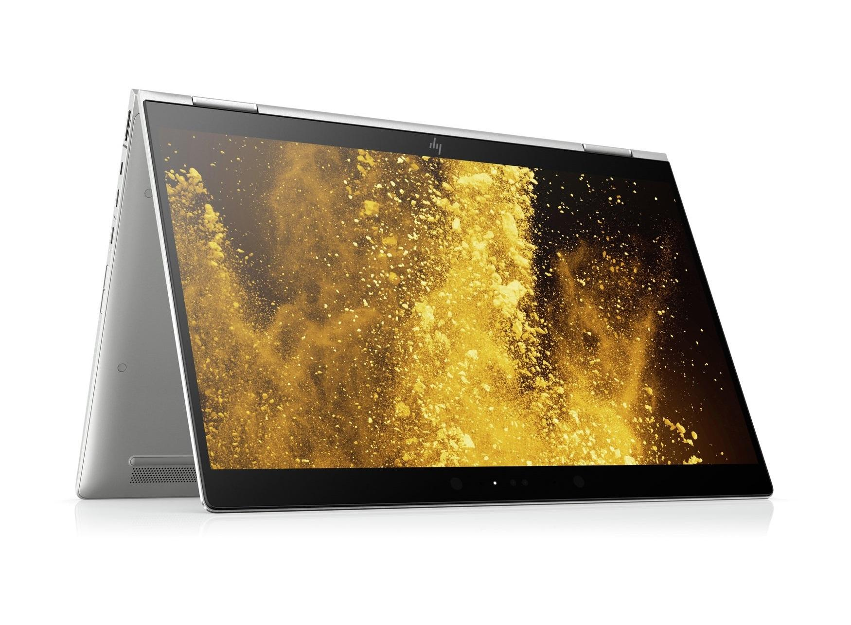 Silberner HP-Laptop geöffnet. Der Bildschirm zeigt ein goldenes explosionsartiges Bild. Der Hintergrund ist weiß.