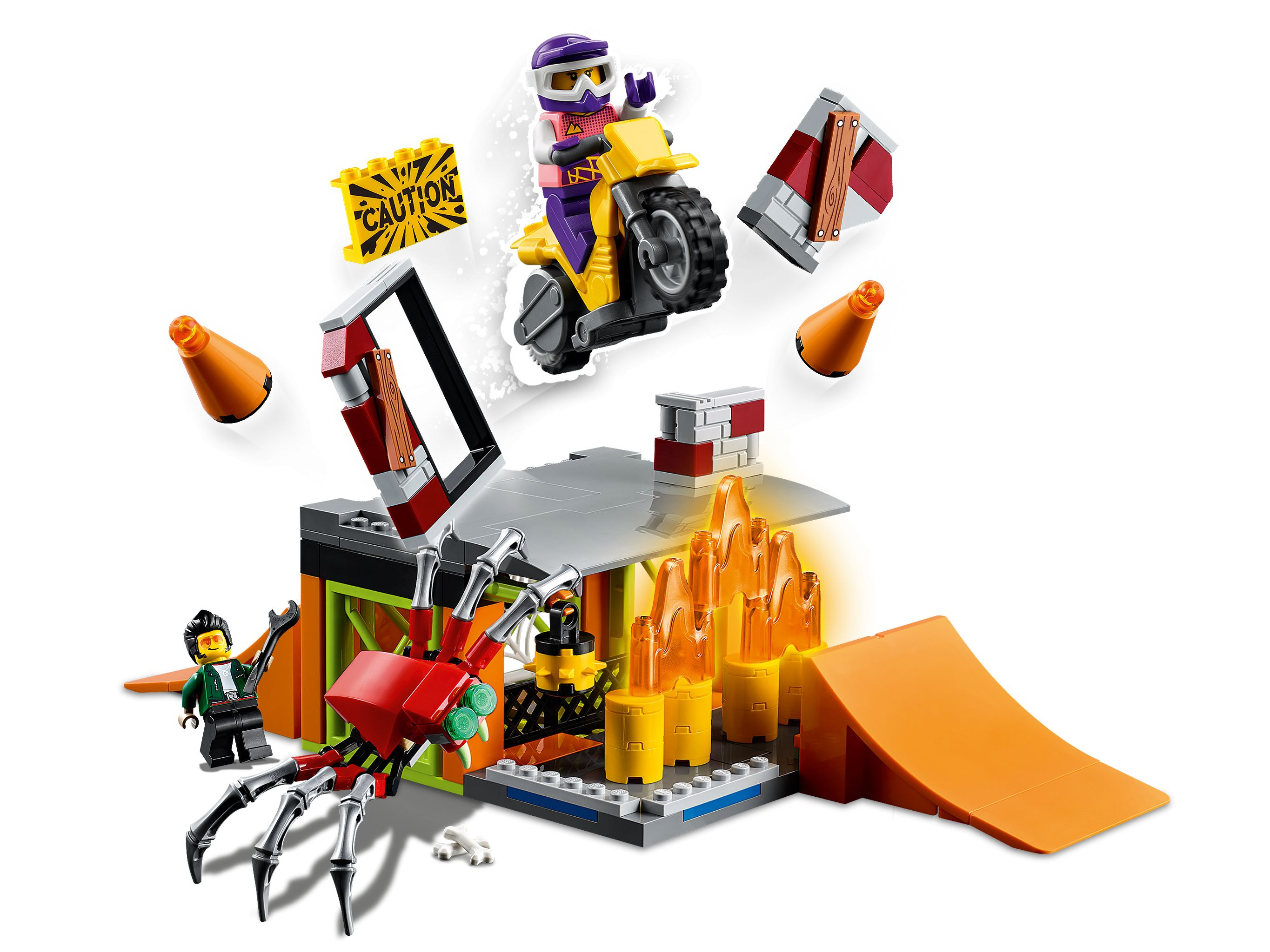 Lego-Set mit Motorrad, Rampe, Feuer, Spinne und Minifiguren. Gelbes Motorrad und Rampe, Vorsichtsschild, rote Spinne.
