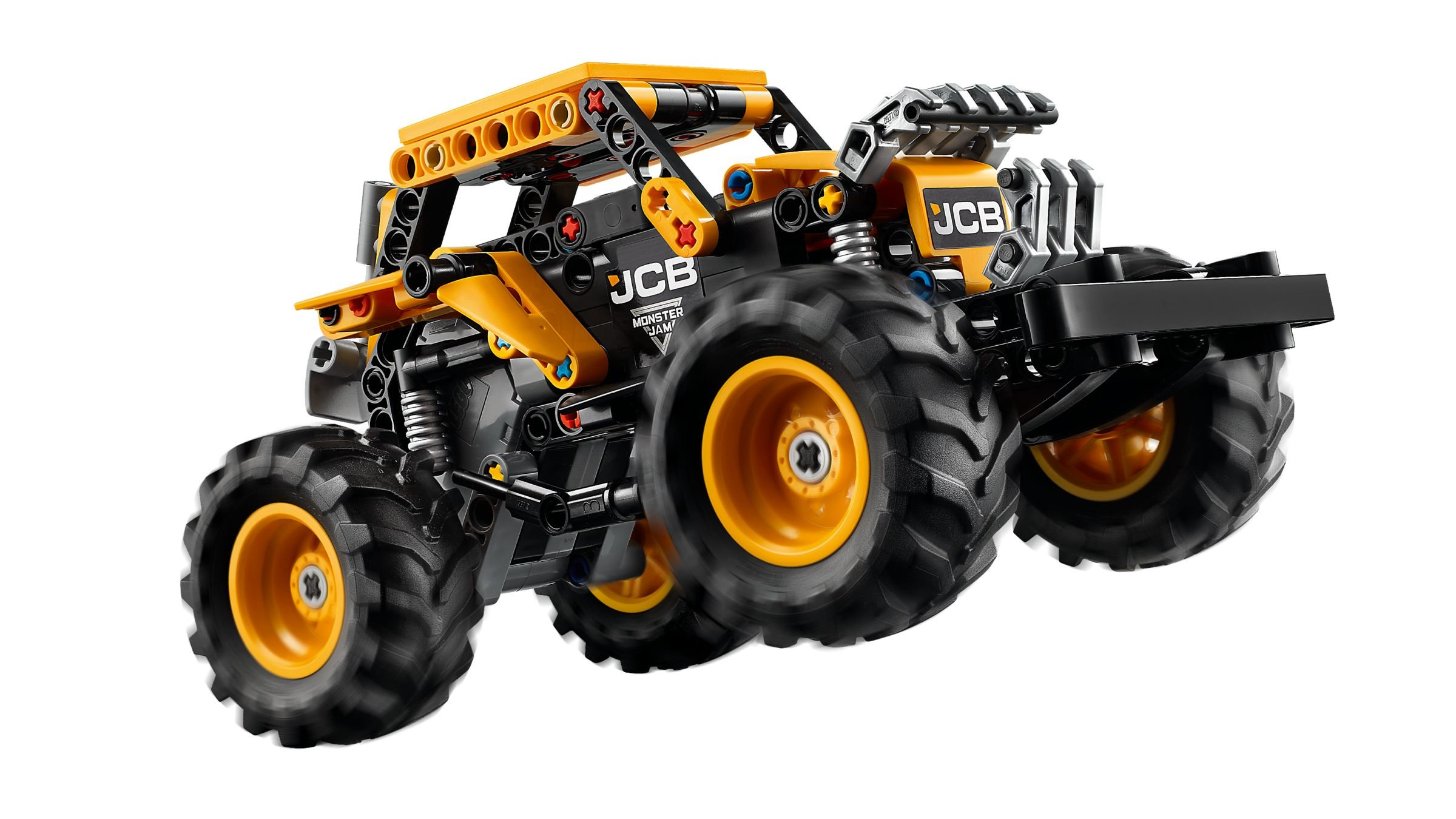 Ein gelb-schwarzes JCB-Monster-Truck-Spielzeug vor weißem Hintergrund. Es hat große Reifen und das JCB-Logo.