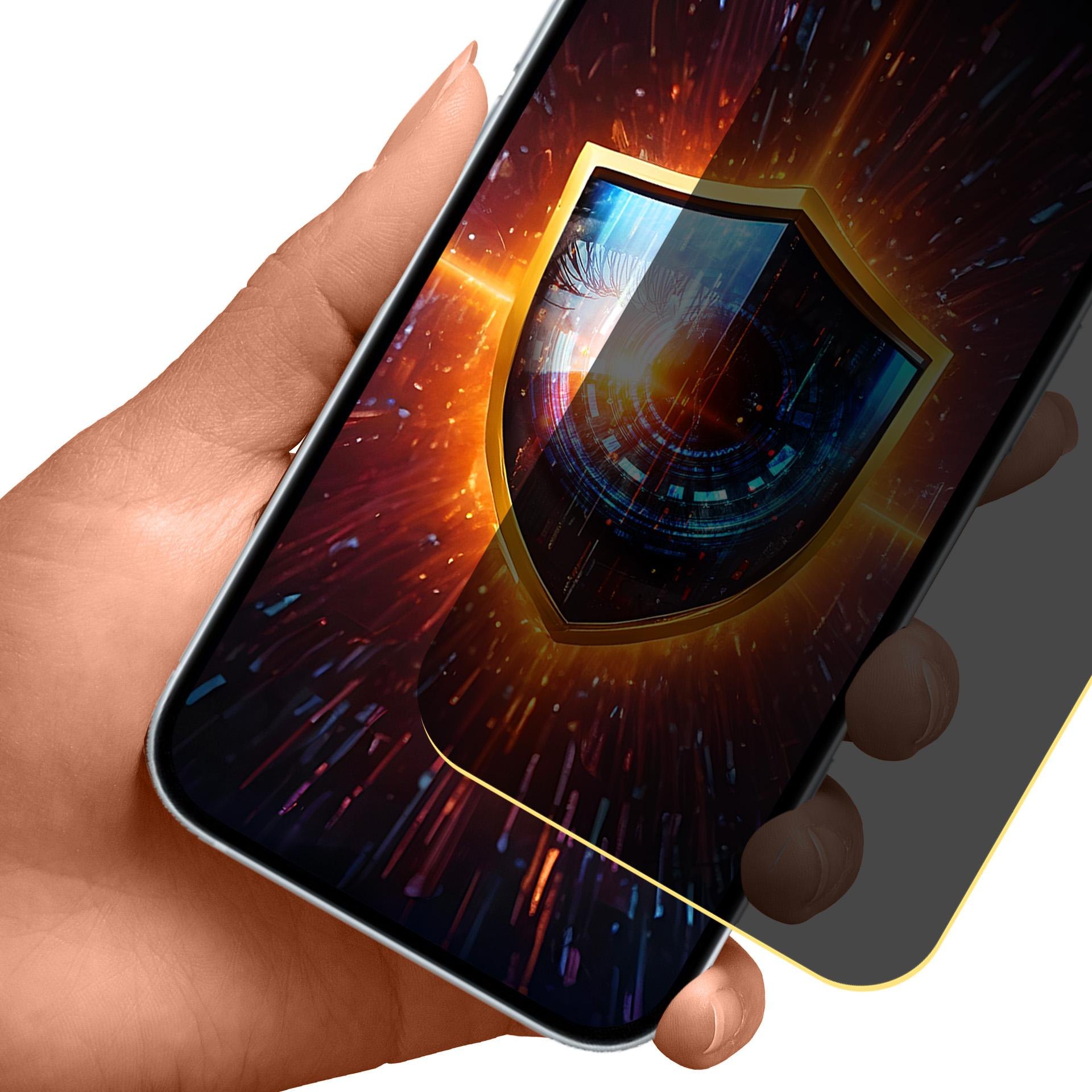 Dłoń trzymająca smartfon z grafiką tarczy na ekranie, otoczona ognistym tłem.