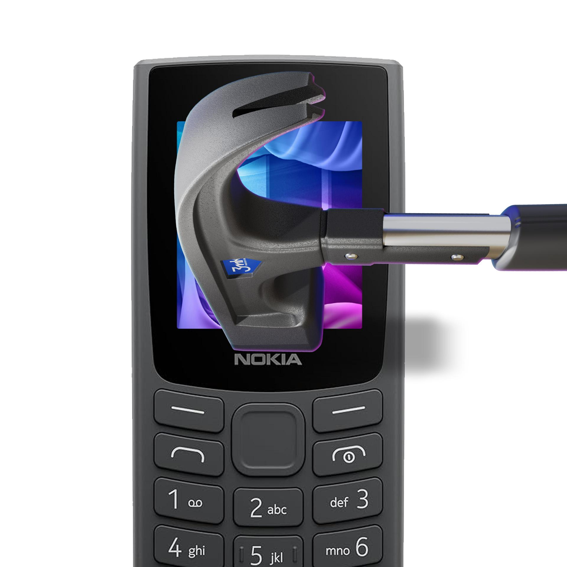 Un telefono Nokia viene distrutto da un martello. Il telefono è grigio, il martello è argento e nero, e lo sfondo è bianco.