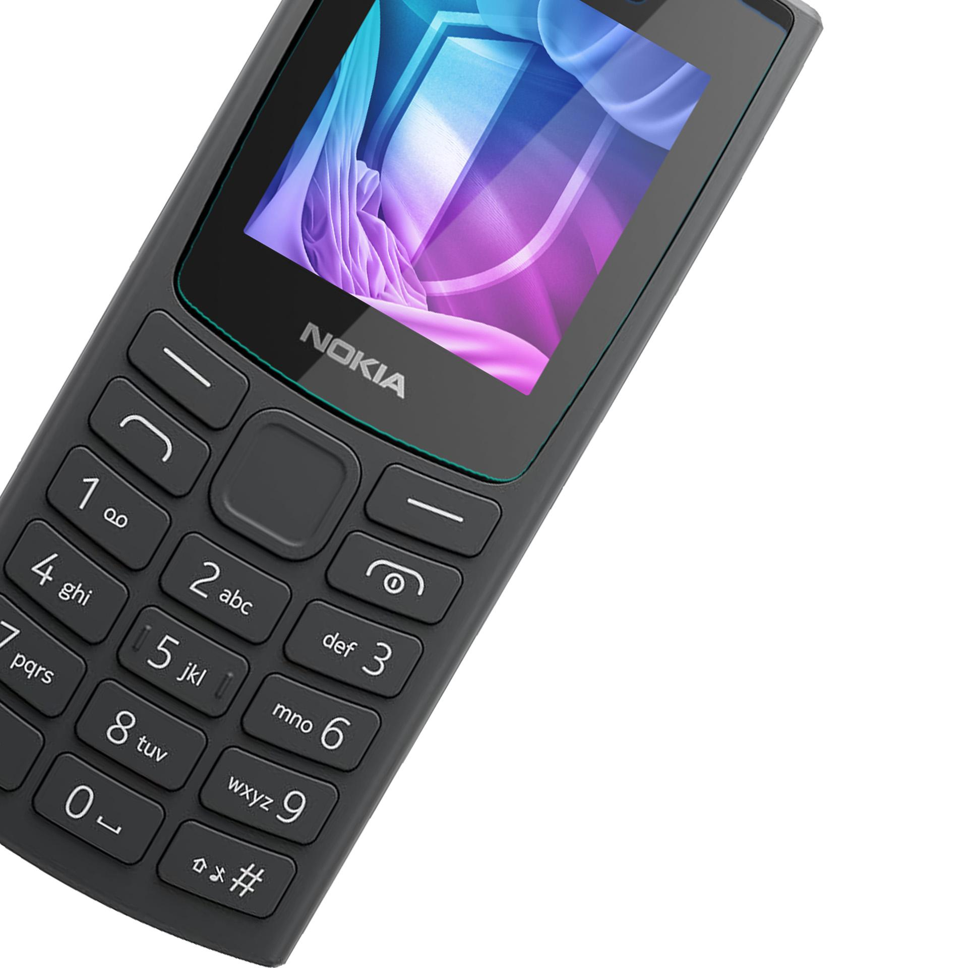 Un telefono Nokia grigio scuro è angolato. Lo schermo mostra un'immagine astratta colorata. La tastiera ha tasti numerici e alfabetici.