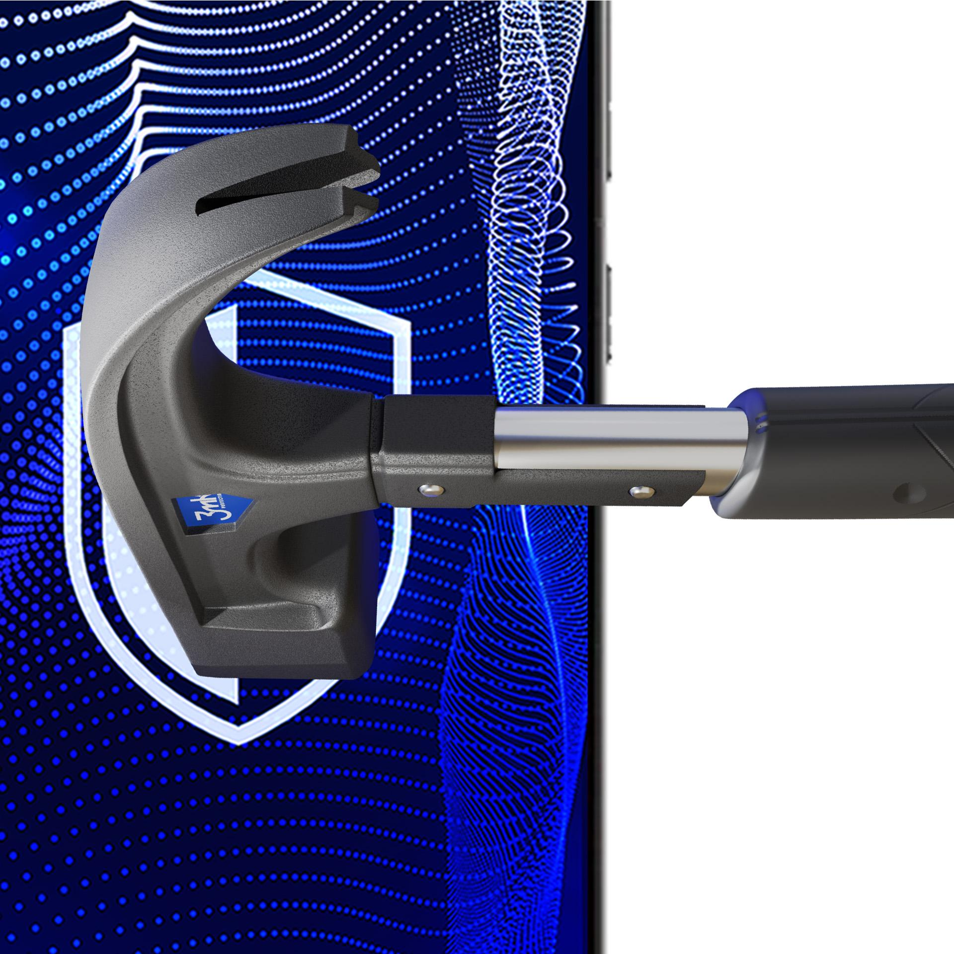 Szary młotek umieszczony nad telefonem. Tło ma niebieskie kropki i linie.