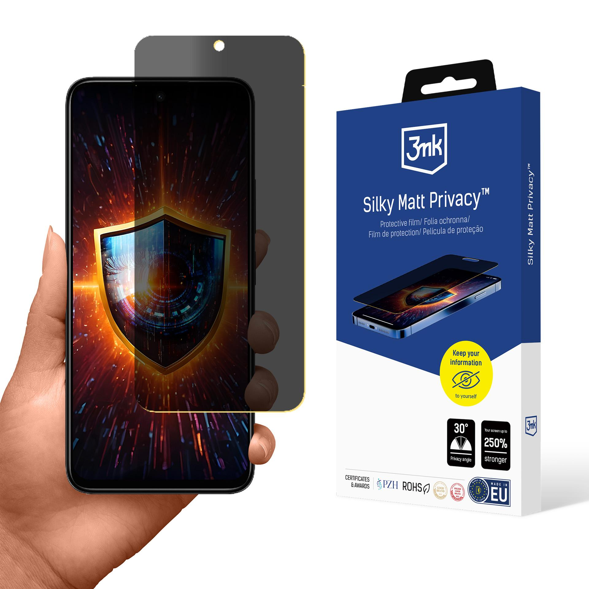 Mano che tiene un telefono con schermo privacy, accanto a una scatola con dettagli.