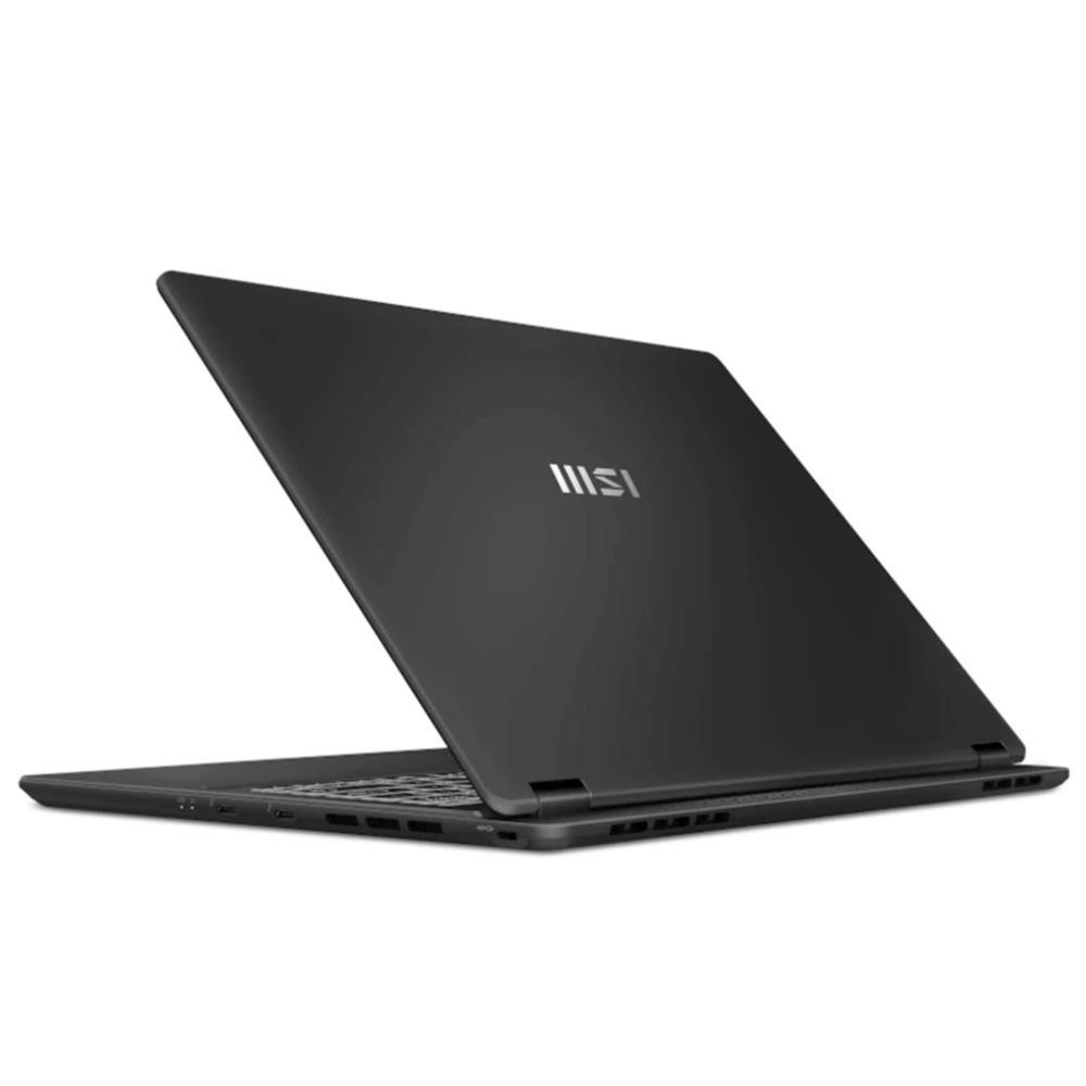 Se muestra un portátil negro abierto. El logotipo de MSI es visible en la tapa. El teclado es visible. El fondo es blanco.