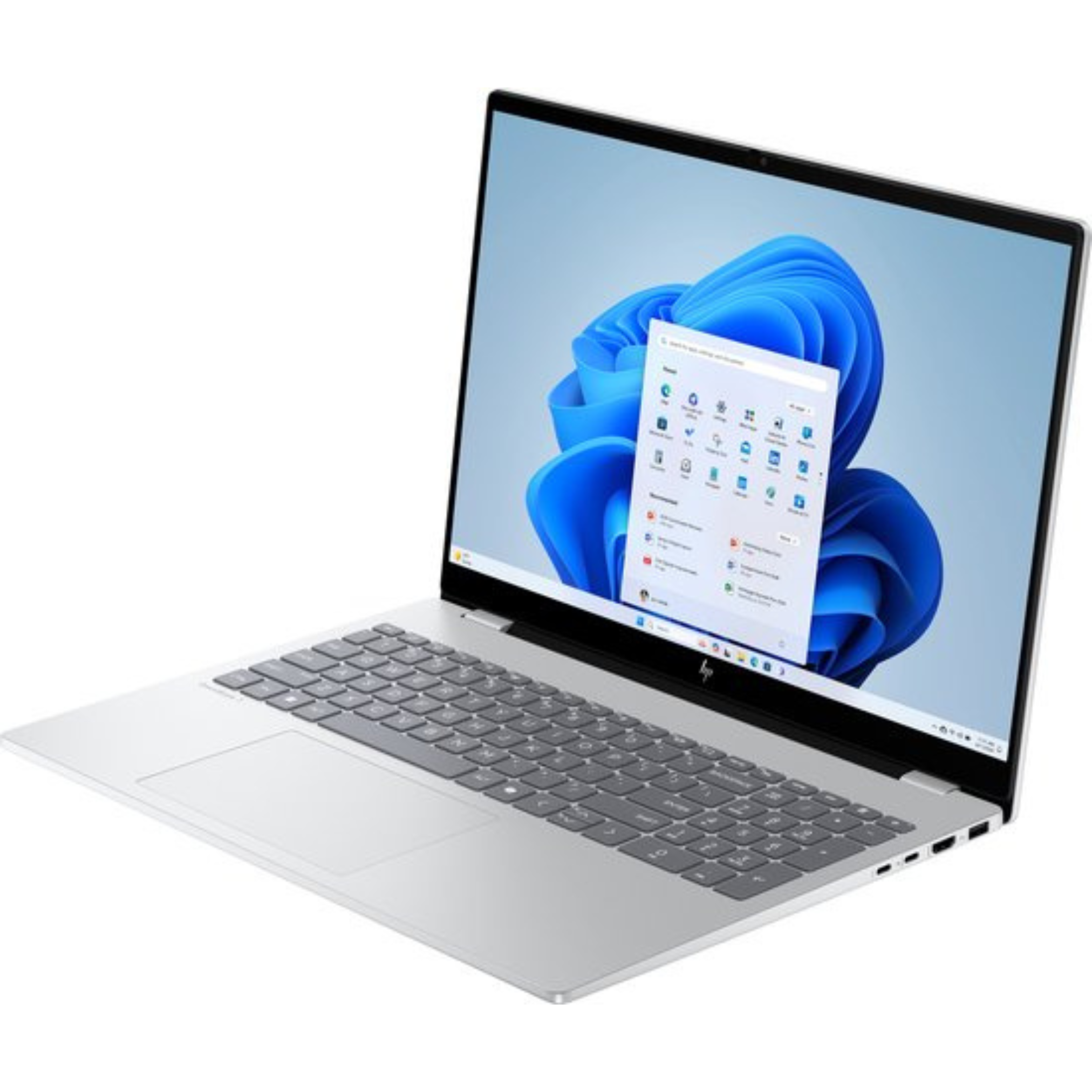 Silver laptop with a Windows 11 screen, displaying app icons. The screen shows a blue background with a Windows logo.