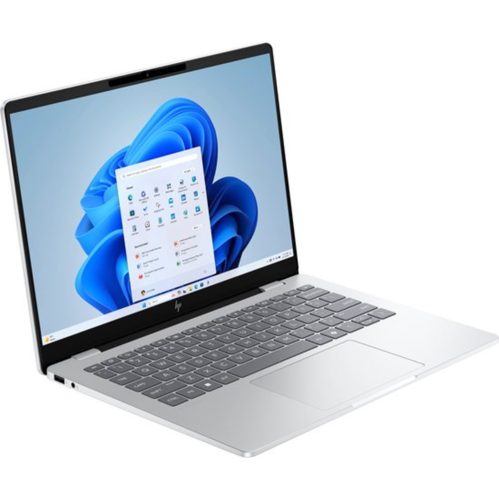 Silver laptop displaying Windows 11 desktop. The screen shows the start menu and blue abstract background.