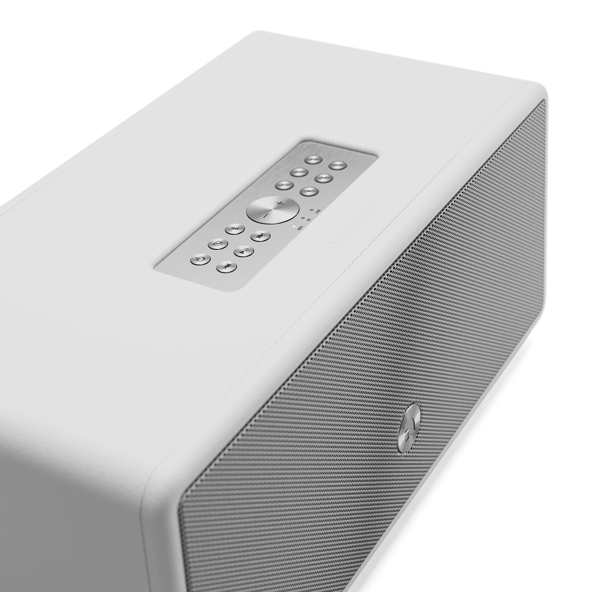 A white rectangular speaker with a silver control panel on top. The speaker has a mesh grill and a green background.