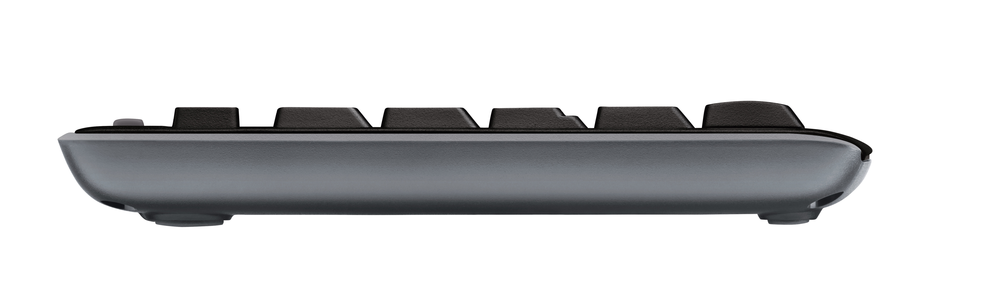 Seitenansicht einer grauen Tastatur. Schwarze Tasten sind sichtbar. Die Basis ist grau mit kleinen Füßen.