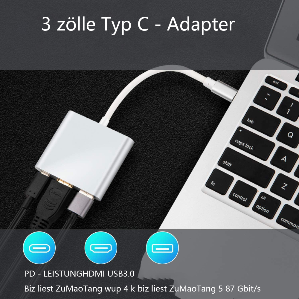 Silberner USB-C-Adapter, der mit einem Laptop verbunden ist. Er hat Anschlüsse für HDMI und USB. Text: 3 zölle Typ C - Adapter.