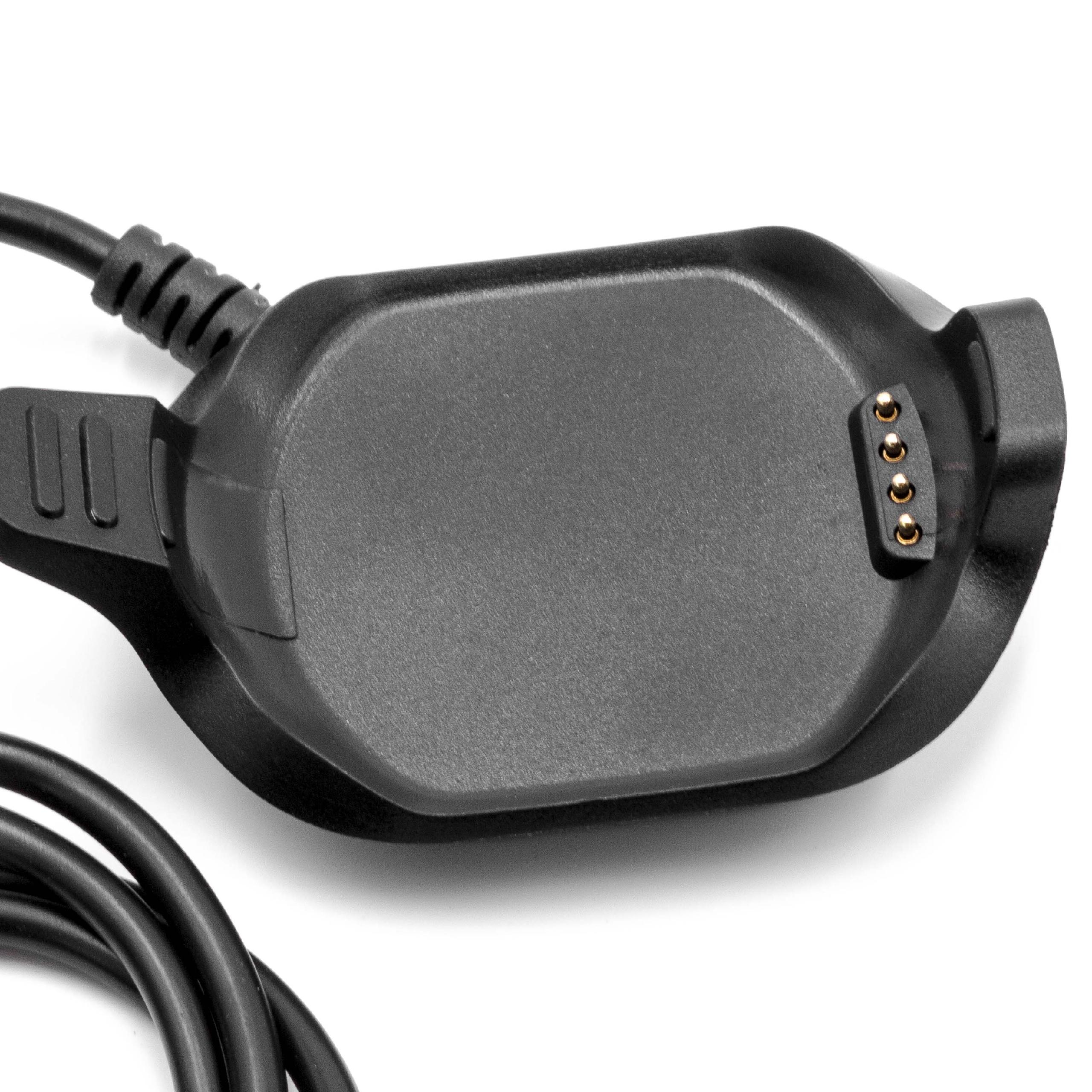 Schwarzes Uhrenladegerät mit zentralem Pad und goldfarbenen Ladestiften. Schwarzes Kabel geht vom Ladegerät ab.