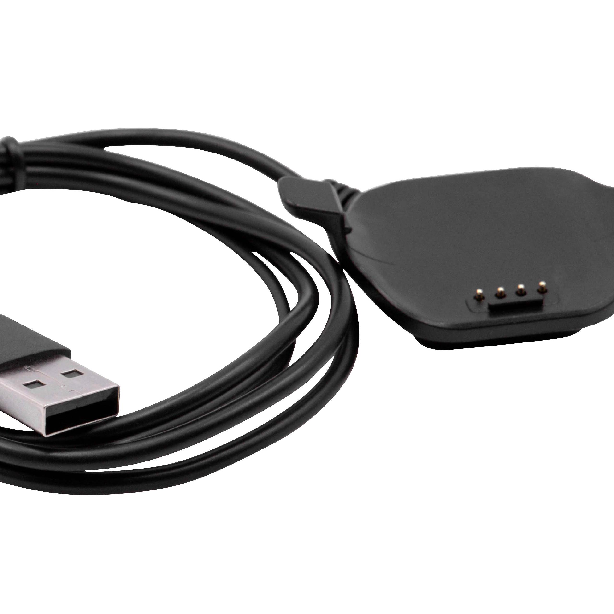 Ein schwarzes Smartwatch-Ladegerät. Auf der linken Seite befindet sich ein USB-Anschluss, rechts die Ladestation, auf weißem Grund.