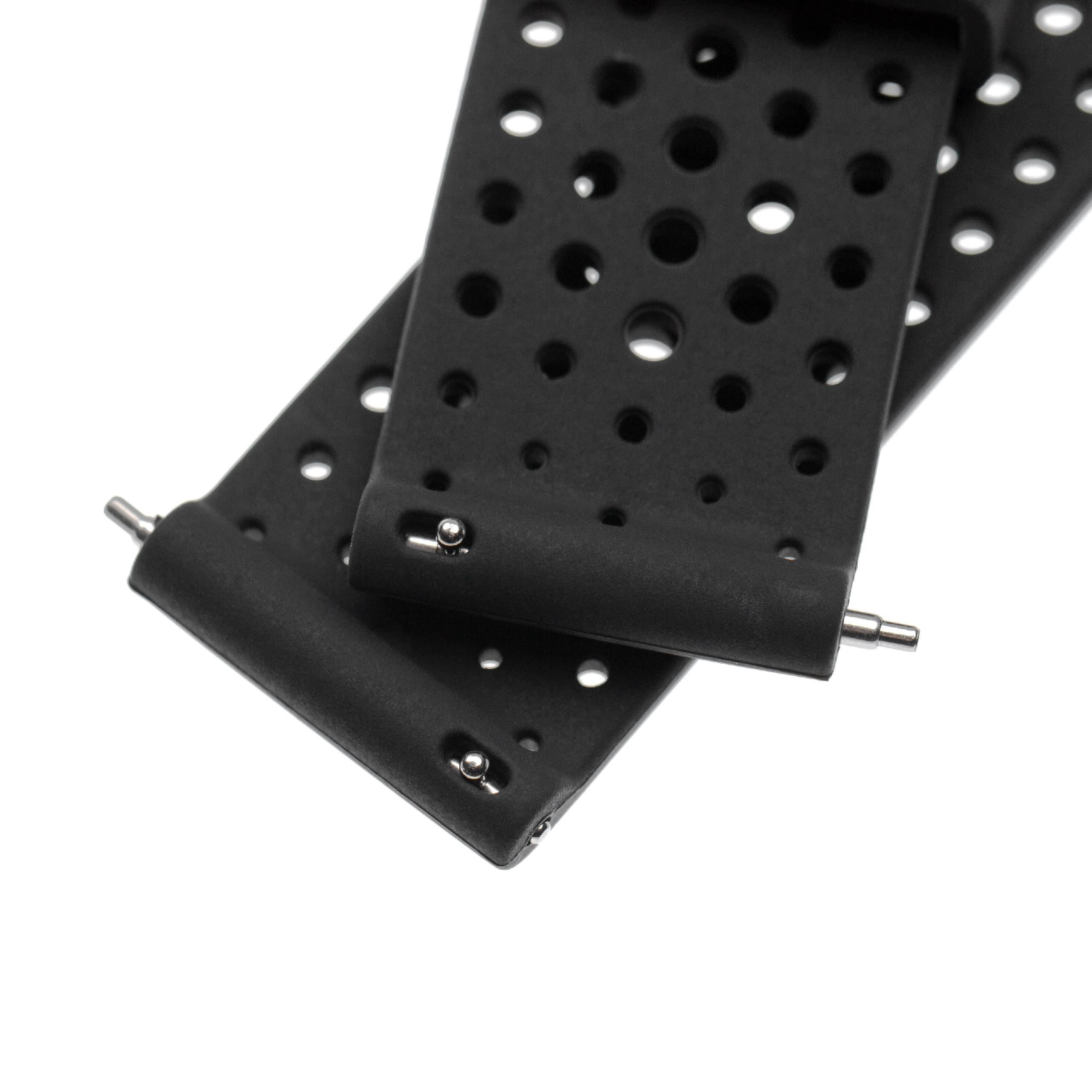 Zwei schwarze Uhrenarmbänder mit Löchern und Metallstiften auf weißem Hintergrund. Ein Armband liegt auf dem anderen.