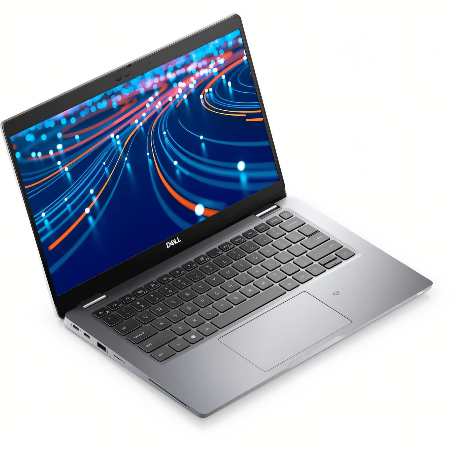 Una laptop Dell está abierta, mostrando una imagen abstracta azul y naranja. El teclado y el panel táctil son visibles en una superficie gris.