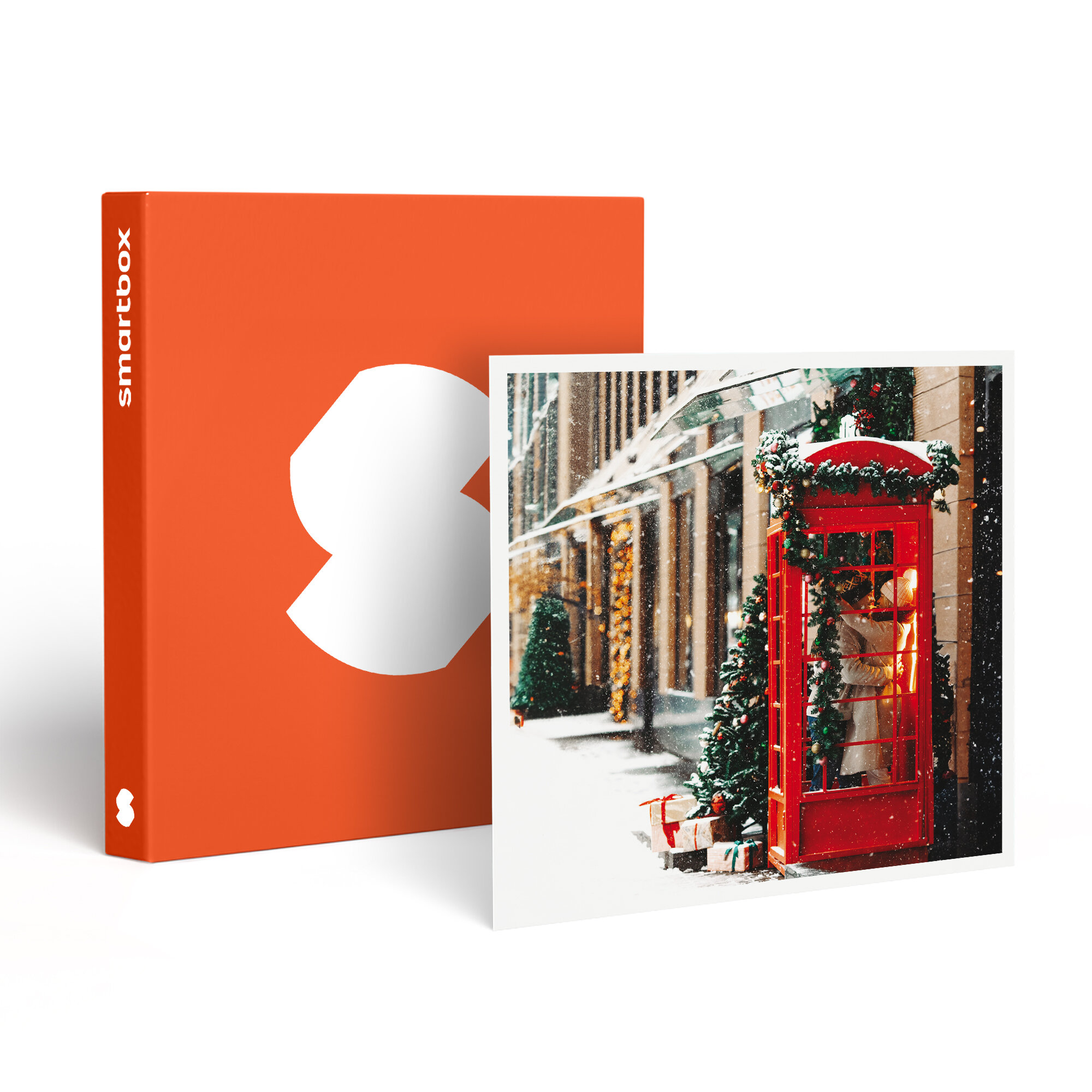 Una Smartbox naranja junto a una foto de una cabina telefónica roja con una pareja dentro, escena nevada.