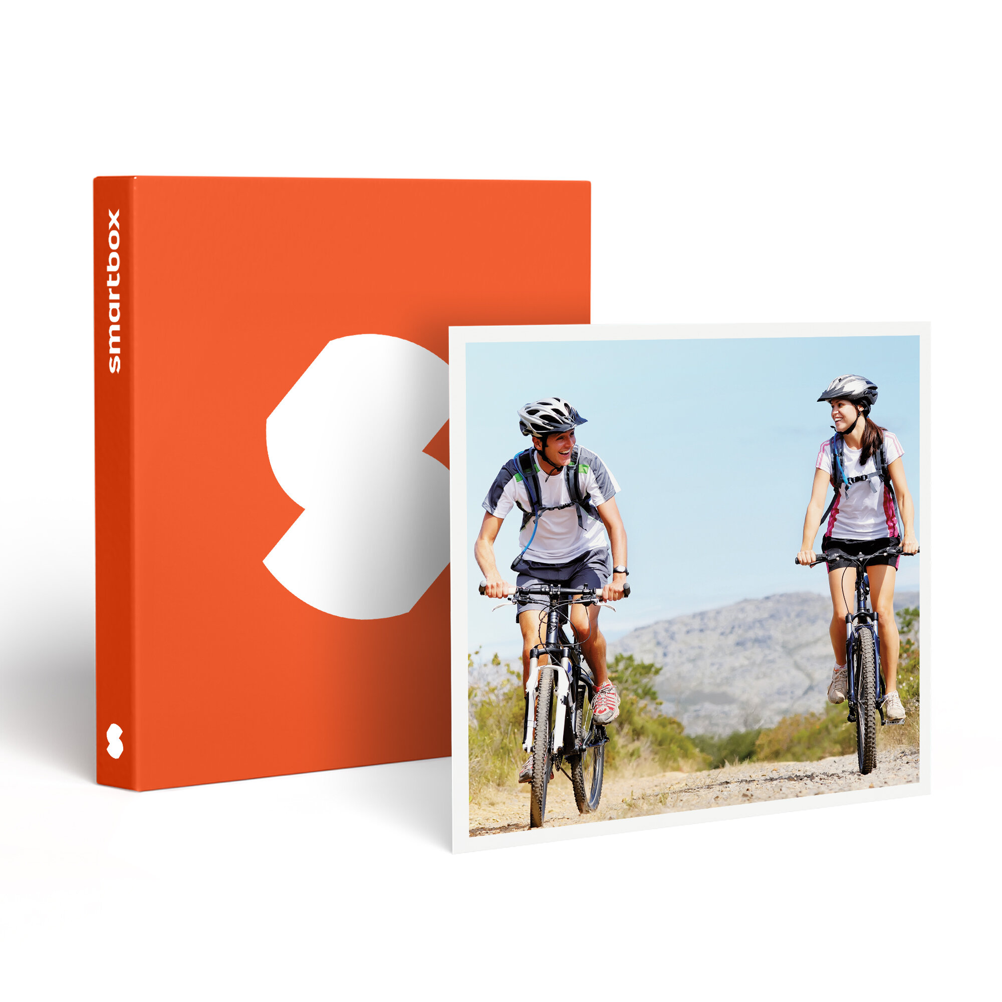 Imagen con una caja y una foto. La foto muestra a dos ciclistas en bicicletas de montaña, usando cascos. Caja naranja a la izquierda.