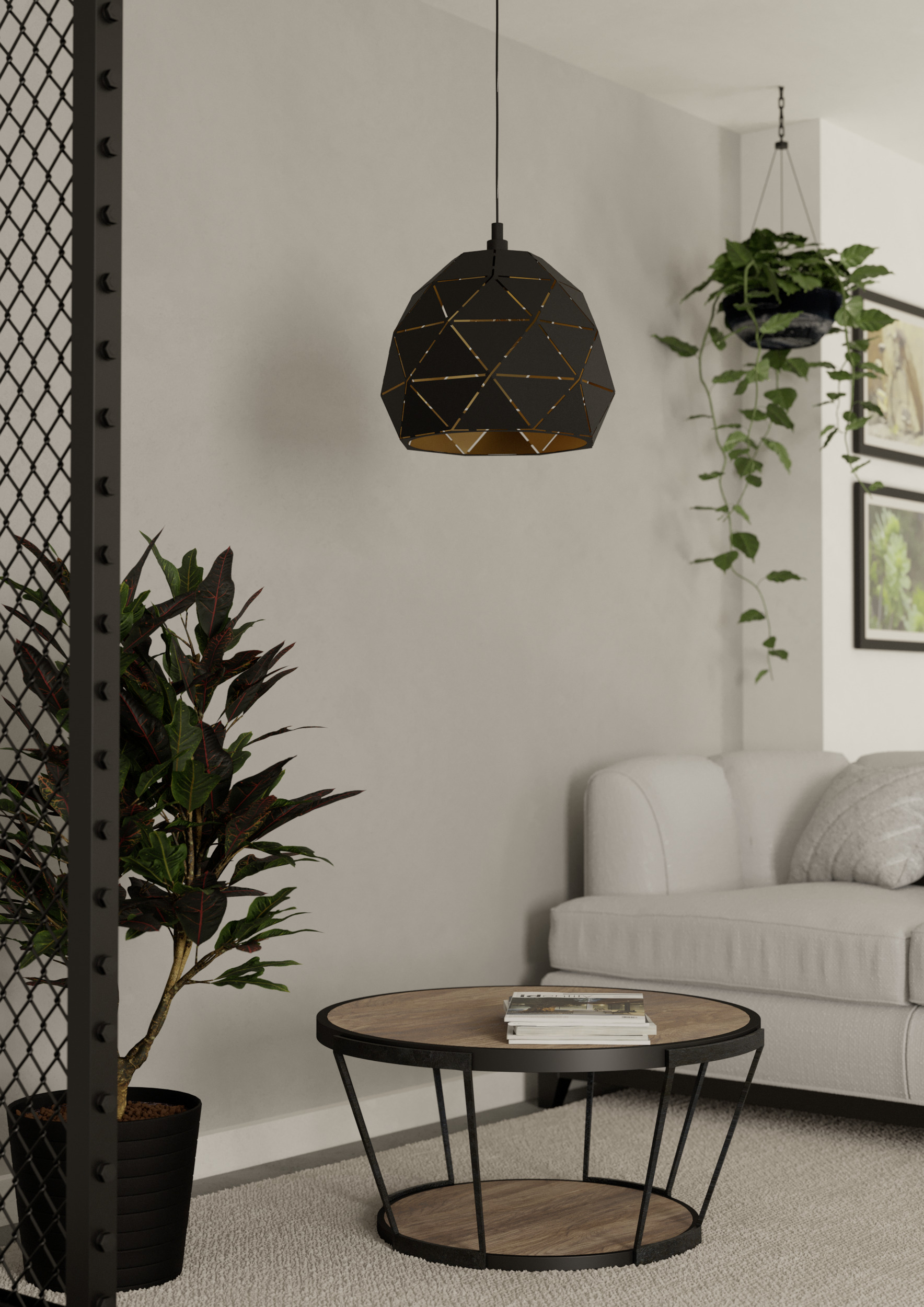 Wohnzimmer: schwarze Lampe, Pflanze, Tisch mit Büchern, weißes Sofa, Hängepflanze, Metallgitter und neutrale Wand.
