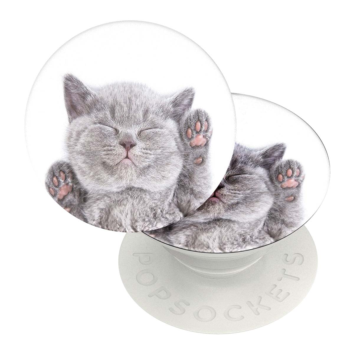 Eine graue Katze liegt auf einem weißen Pop-Socket. Es hat die Augen geschlossen und die Pfoten hoch.