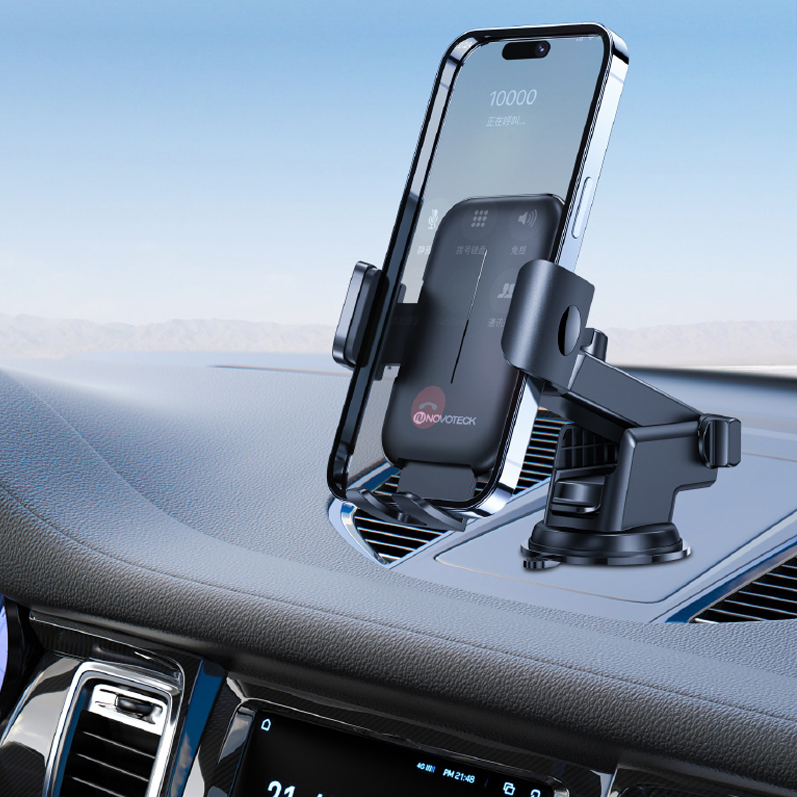 Un teléfono en un soporte para automóvil en el tablero del automóvil. El teléfono muestra una pantalla de llamada. El fondo es una cordillera.