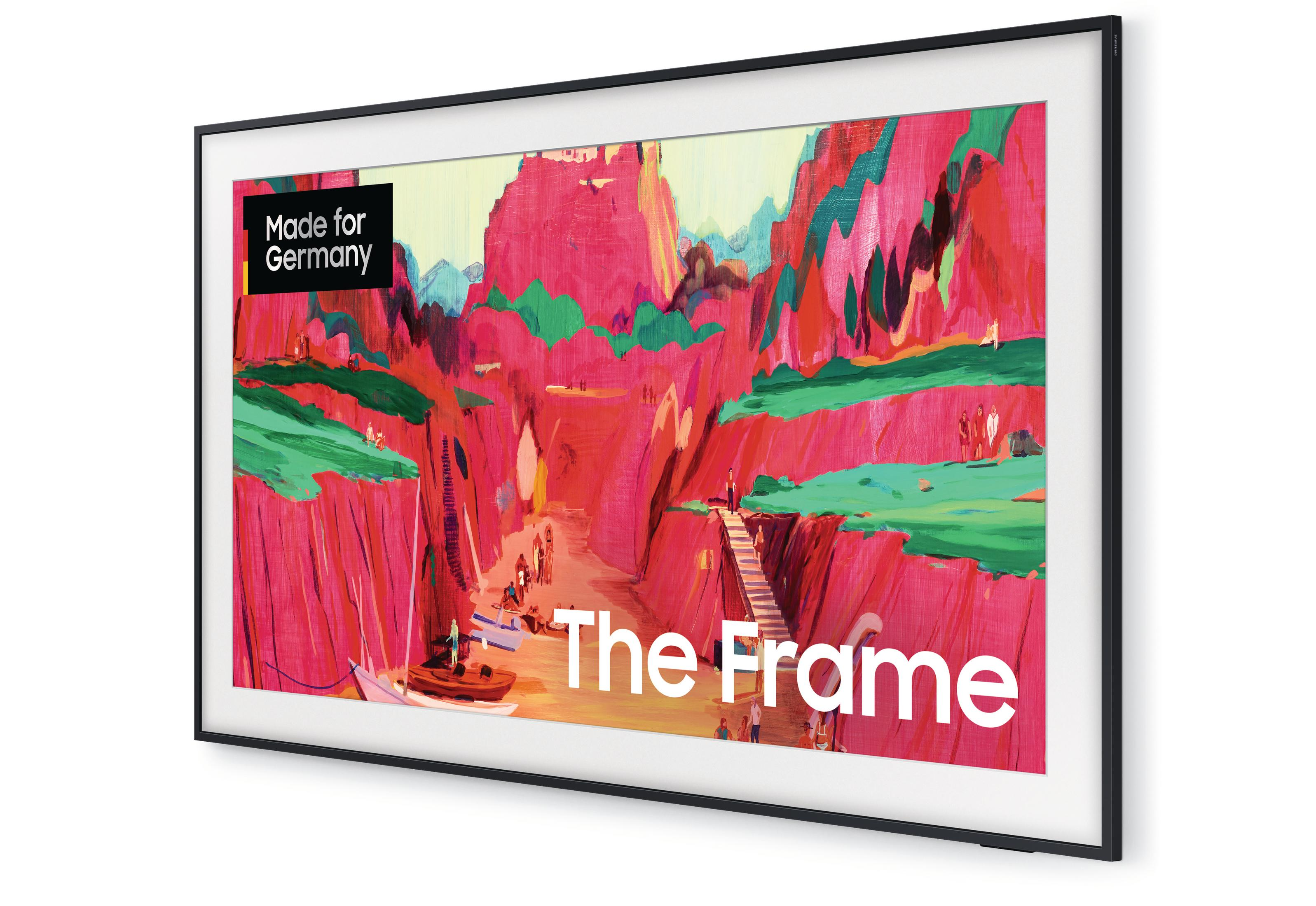 Telewizor The Frame wyświetla kolorowy obraz kanionu z ludźmi i łodziami. Tekst brzmi 'Made for Germany'.