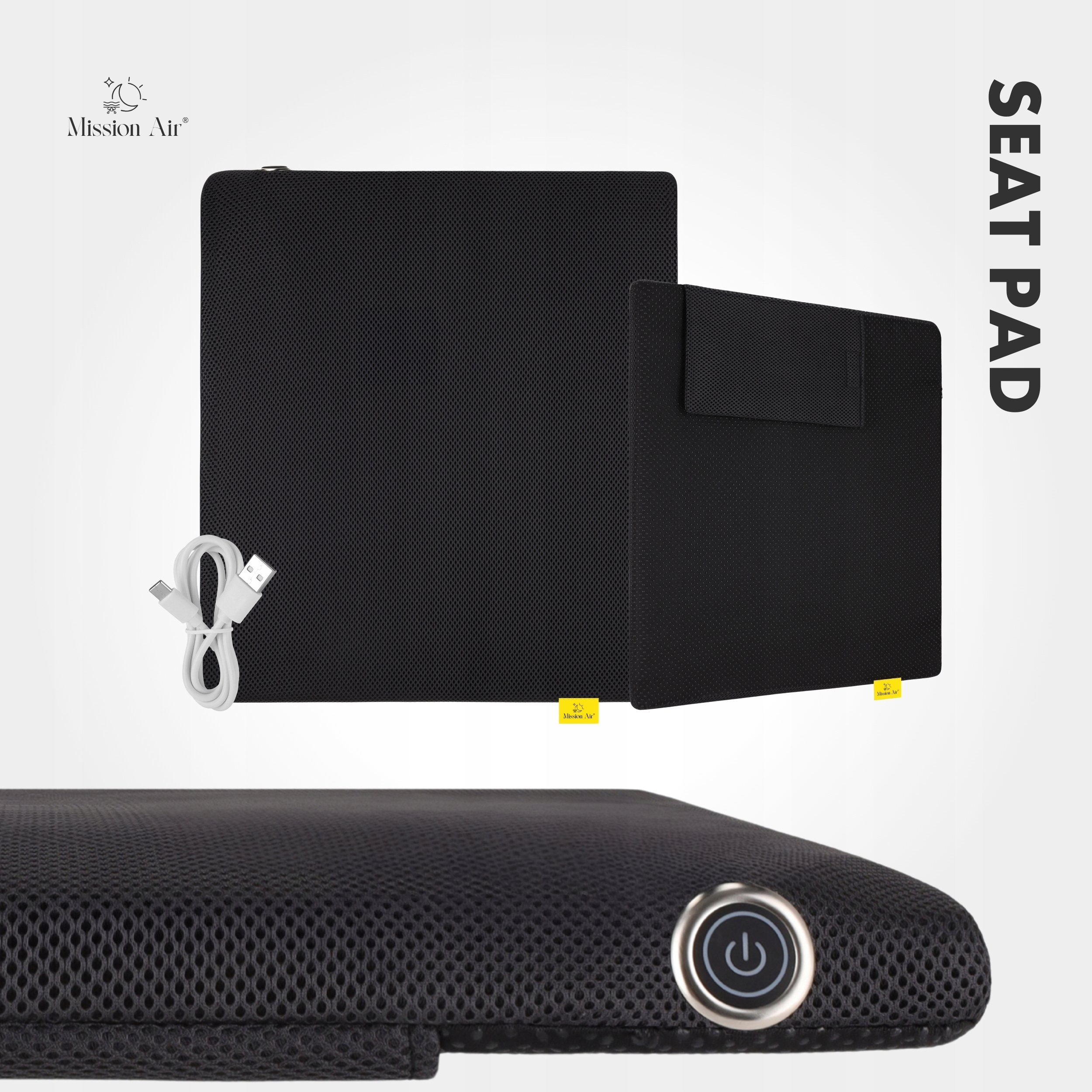 Czarna podkładka pod siedzenie z kablem USB. Na podkładce napis 'Mission Air'. Tekst z boku to 'SEAT PAD'.