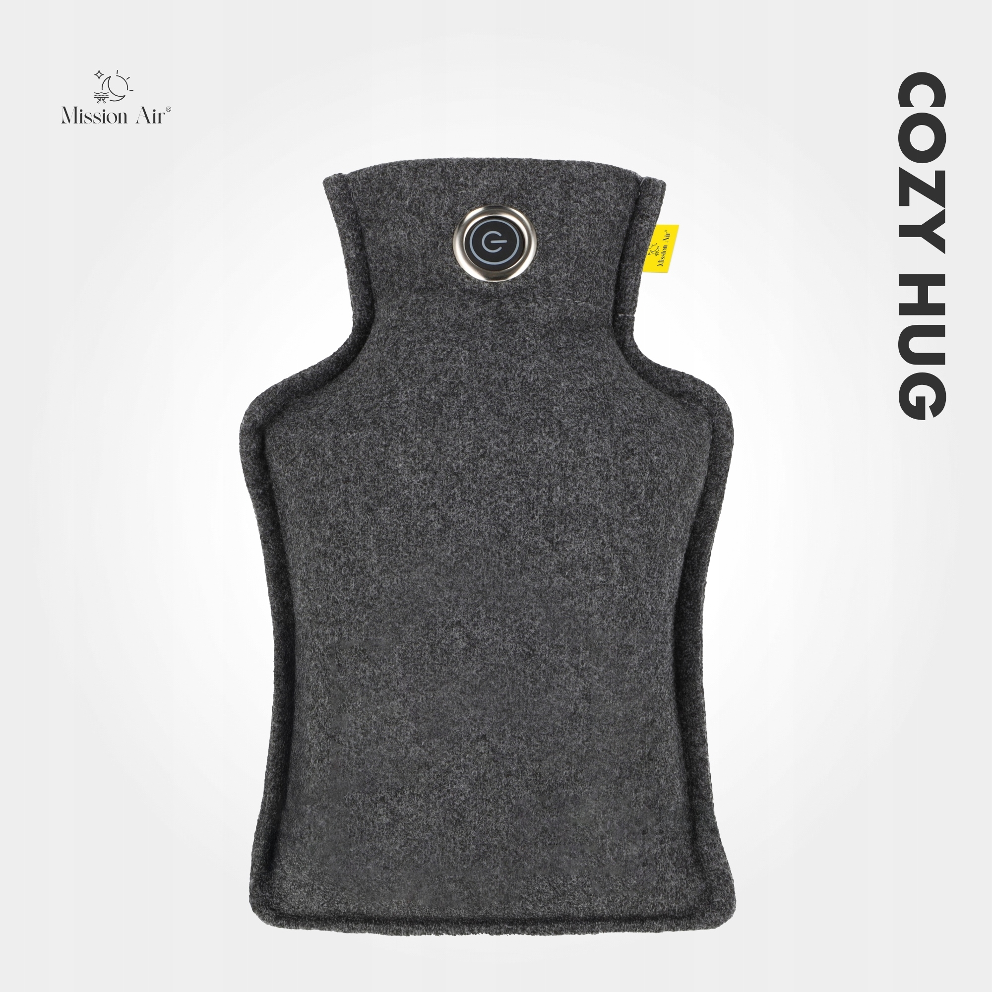 Szara, filcowa poduszka grzewcza Cozy Hug z przyciskiem włącz/wyłącz. Logo Mission Air u góry po lewej.