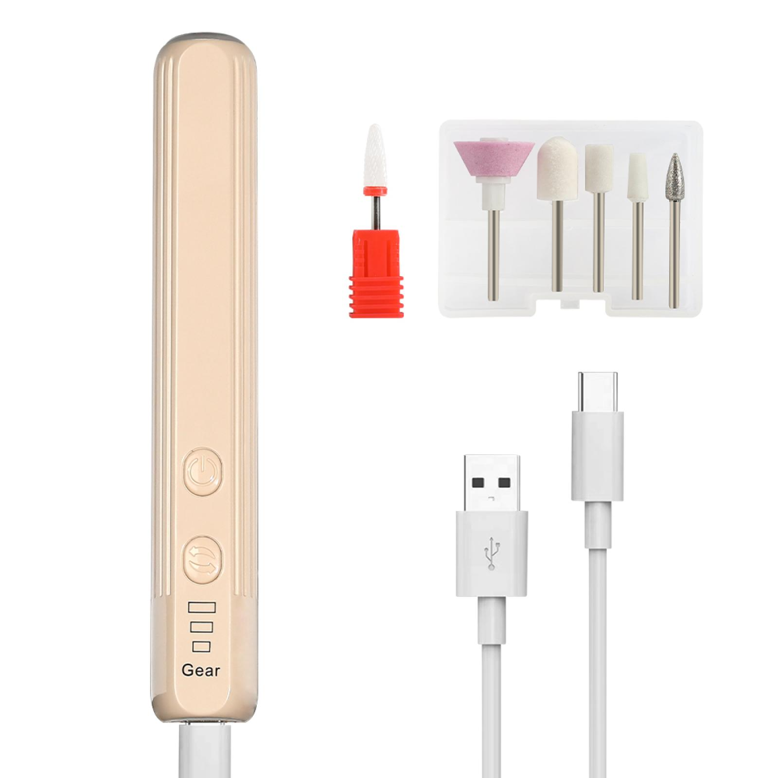 Ein goldener Nagelbohrer mit Aufsätzen. USB- und Typ-C-Kabel sind abgebildet. Verschiedene Bohrer sind in einer transparenten Box platziert.