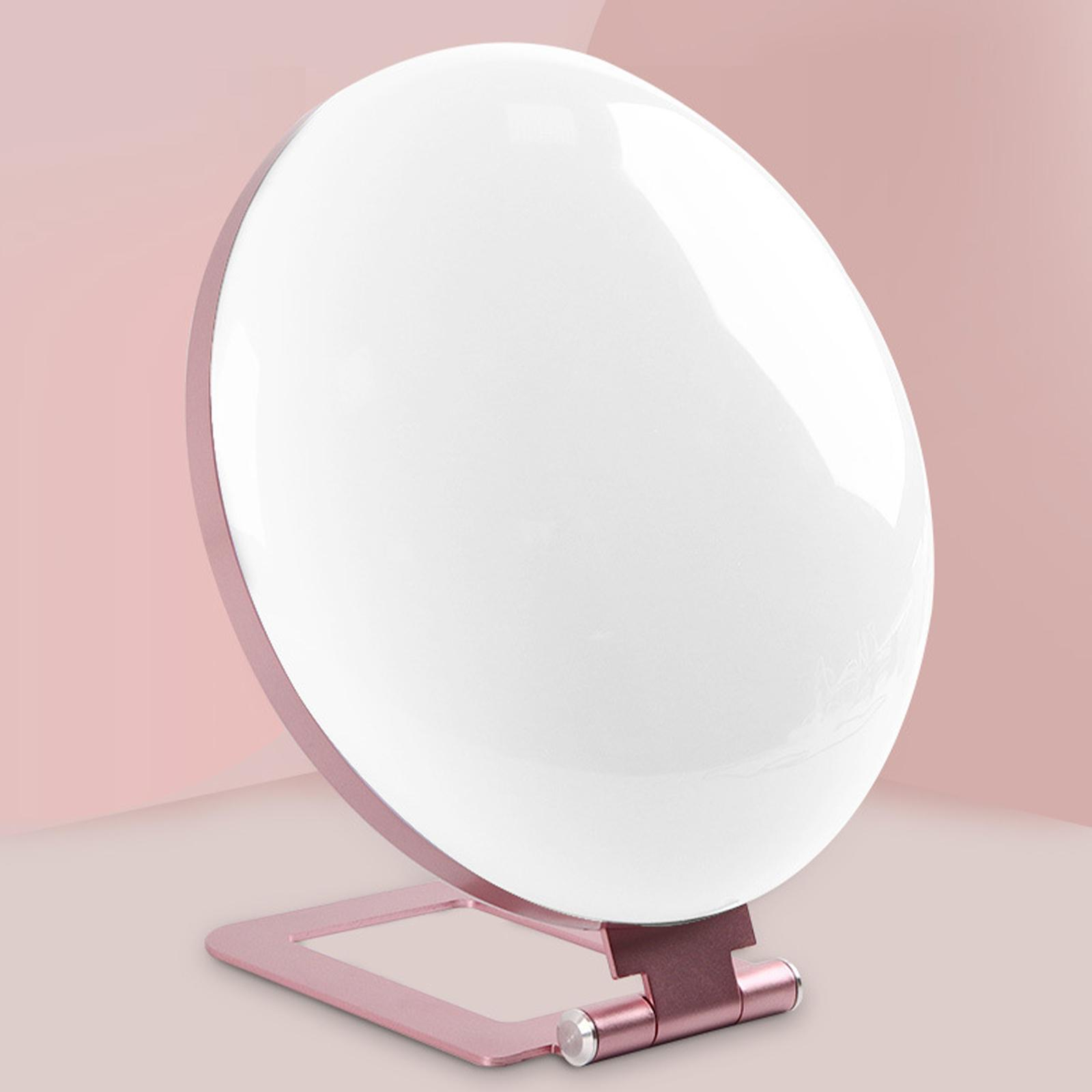Ein weißes, oval geformtes Licht steht auf einem rosa Ständer. Der Hintergrund ist ein Gradient aus hell- und dunkelrosa.