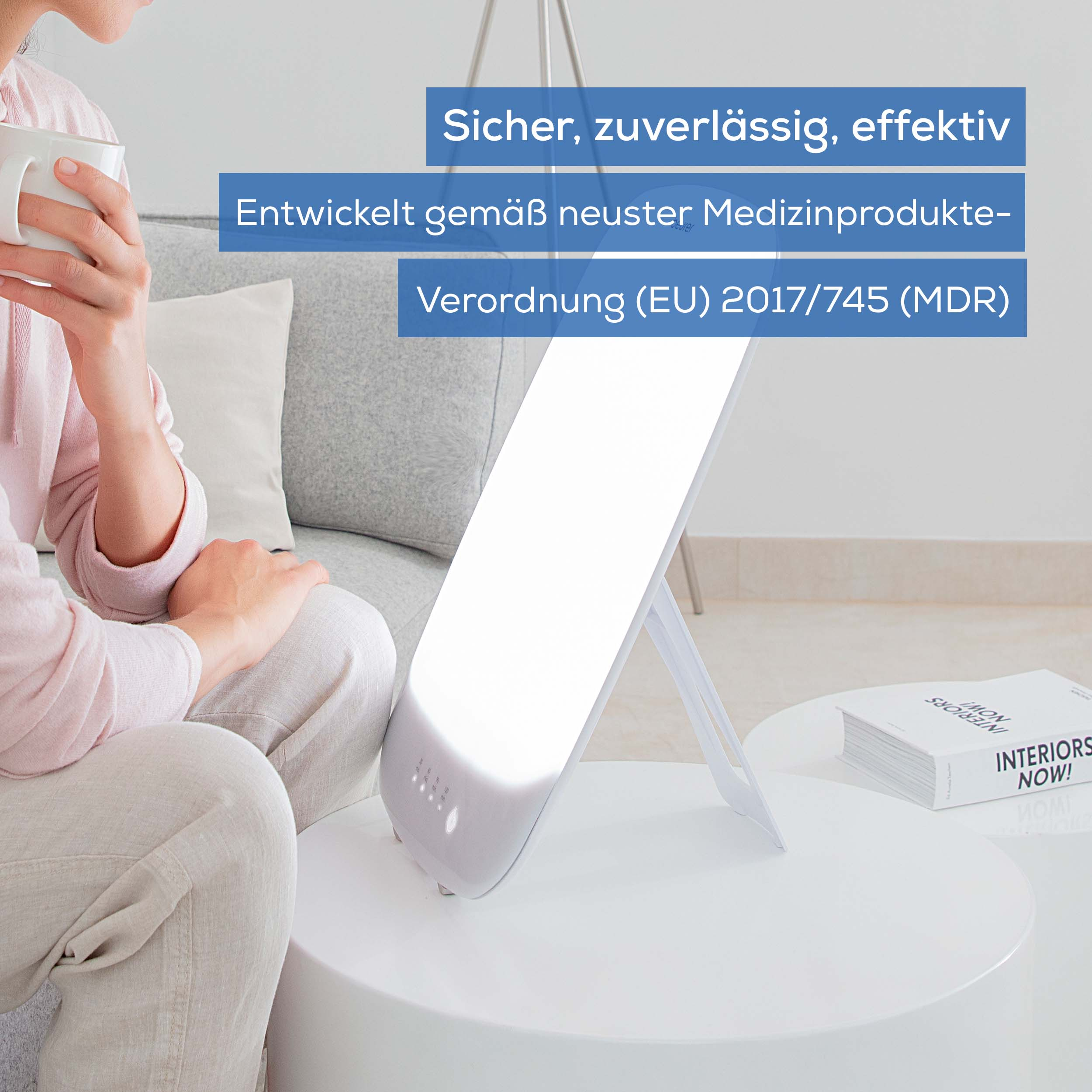 A woman holding a cup, near a white light therapy device. Text on it says: safe, reliable, effective.
