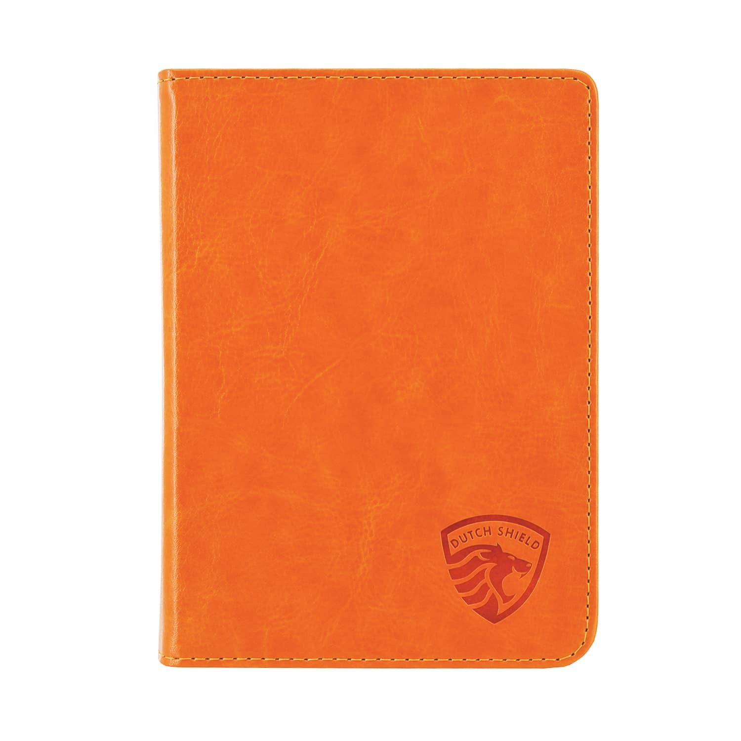 Een oranje leren notitieboek, met 'DUTCH SHIELD' en een leeuwenlogo rechtsonder.