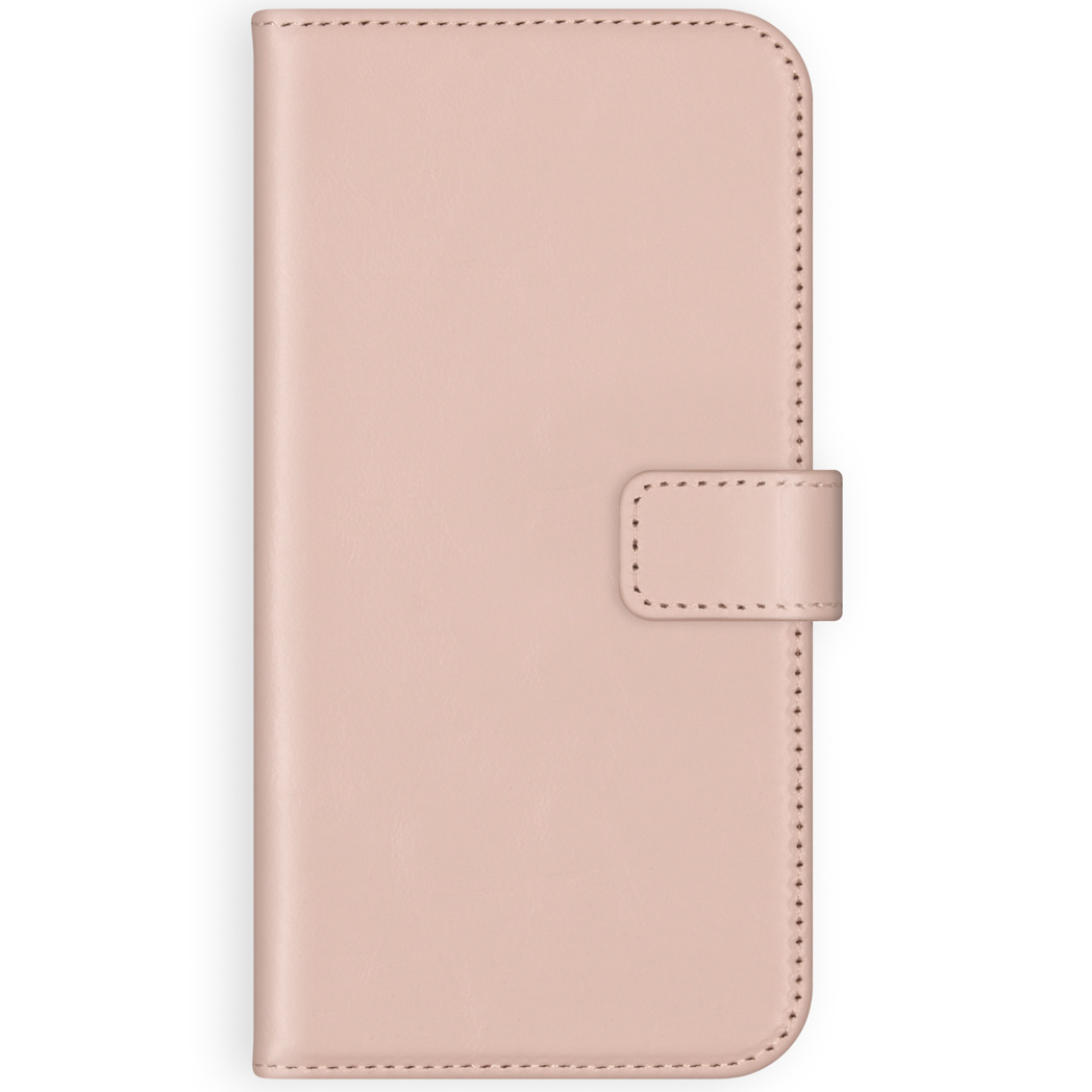 Una custodia per telefono in pelle rosa chiaro con chiusura magnetica, bordi cuciti e superficie liscia. È su sfondo bianco.