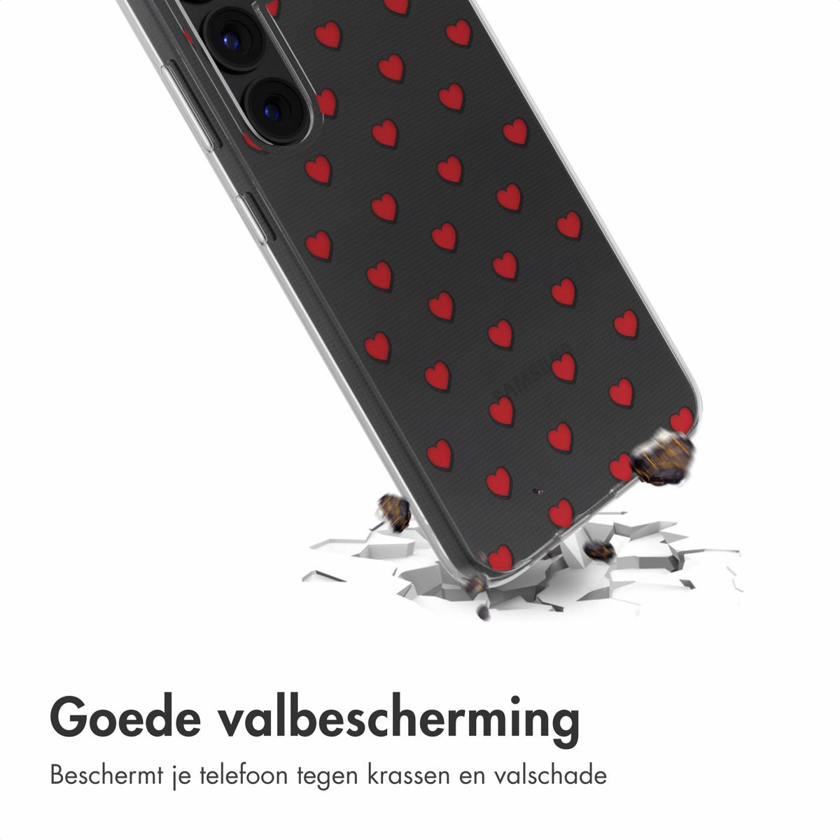 Een telefoonhoesje met rode harten op een zwarte achtergrond, dat valt en een wit oppervlak breekt. Tekst: Goede valbescherming.