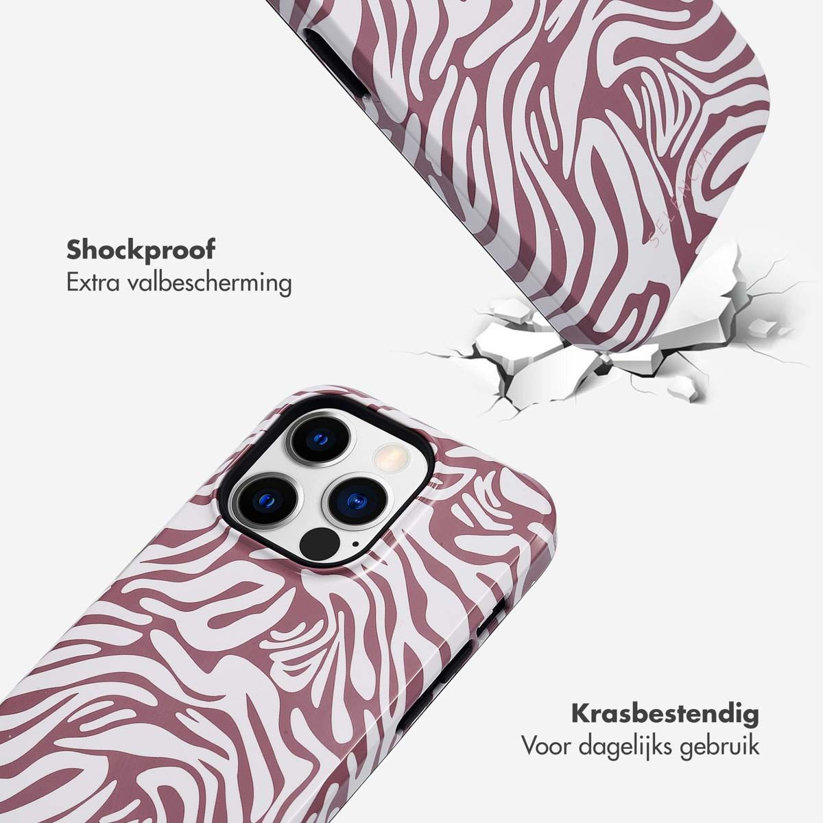 Telefoonhoesje met zebrapatroon, valt en raakt het oppervlak, waardoor het scheurt. Tekst: Schokbestendig.