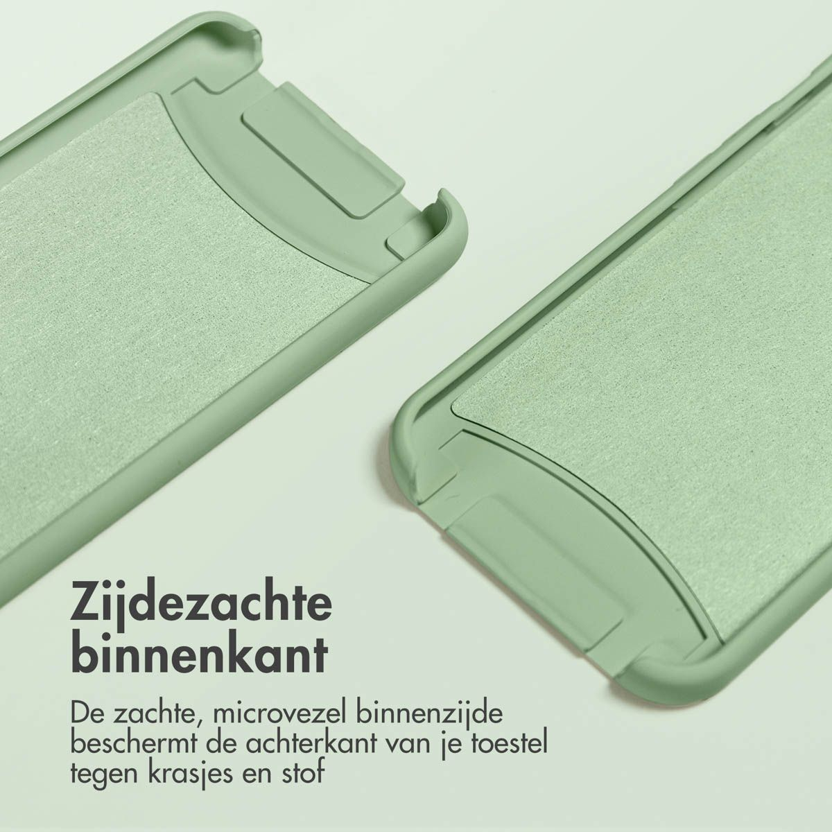 Zwei hellgrüne, offene Handyhüllen. Der Text 'Weiches Innere' und eine niederländische Beschreibung sind sichtbar. Die Hüllen liegen auf weißem Untergrund.