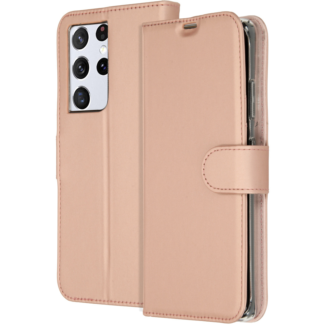 Een roze telefoonhoes is open en onthult een telefoon. De hoes heeft een magnetische sluiting en de stiksels zijn zichtbaar.