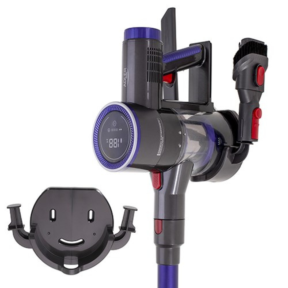 Szaro-fioletowy odkurzacz bezprzewodowy, w tym szczotka i stacja ładująca, na białym tle.