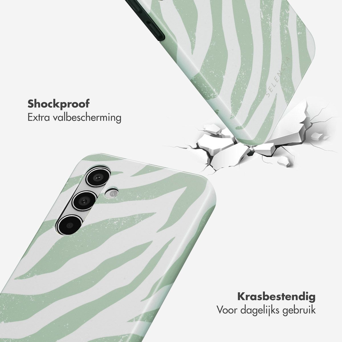 Twee telefoonhoesjes met zebrapatroon, één die de grond raakt. Tekst zegt 'Schokbestendig' en 'Krasbestendig'.