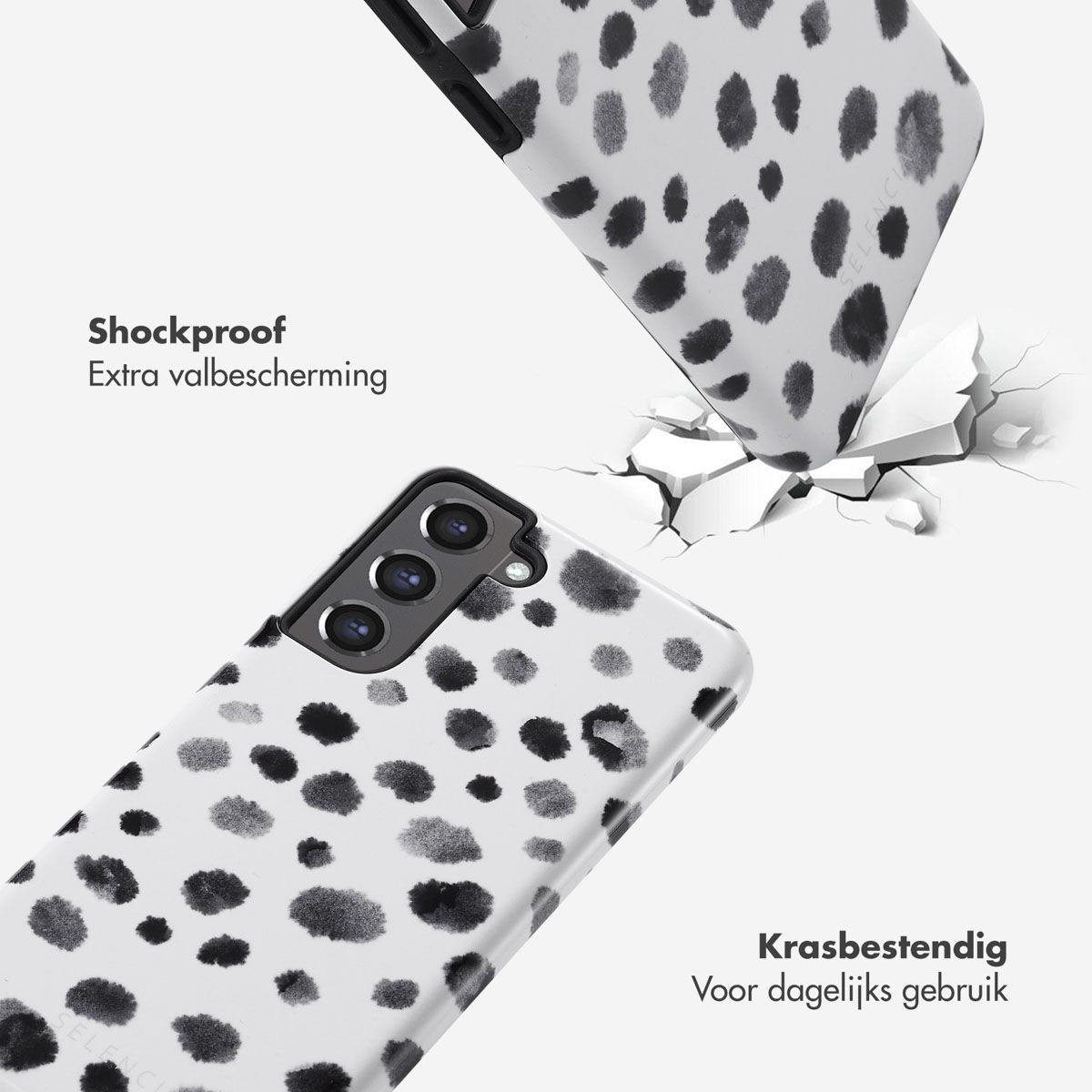 Due custodie per telefono con motivo dalmata. Una che rompe una superficie, l'altra in basso. Testo antiurto e antigraffio.