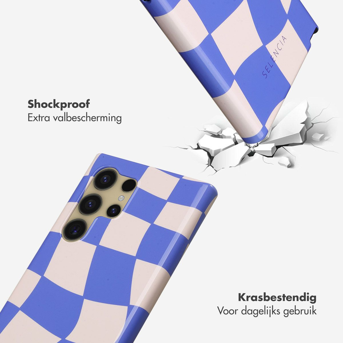 Twee telefoonhoesjes met blauw-wit geblokt patroon vallen, één raakt de grond en veroorzaakt scheuren. Tekst zegt 'Schokbestendig'.