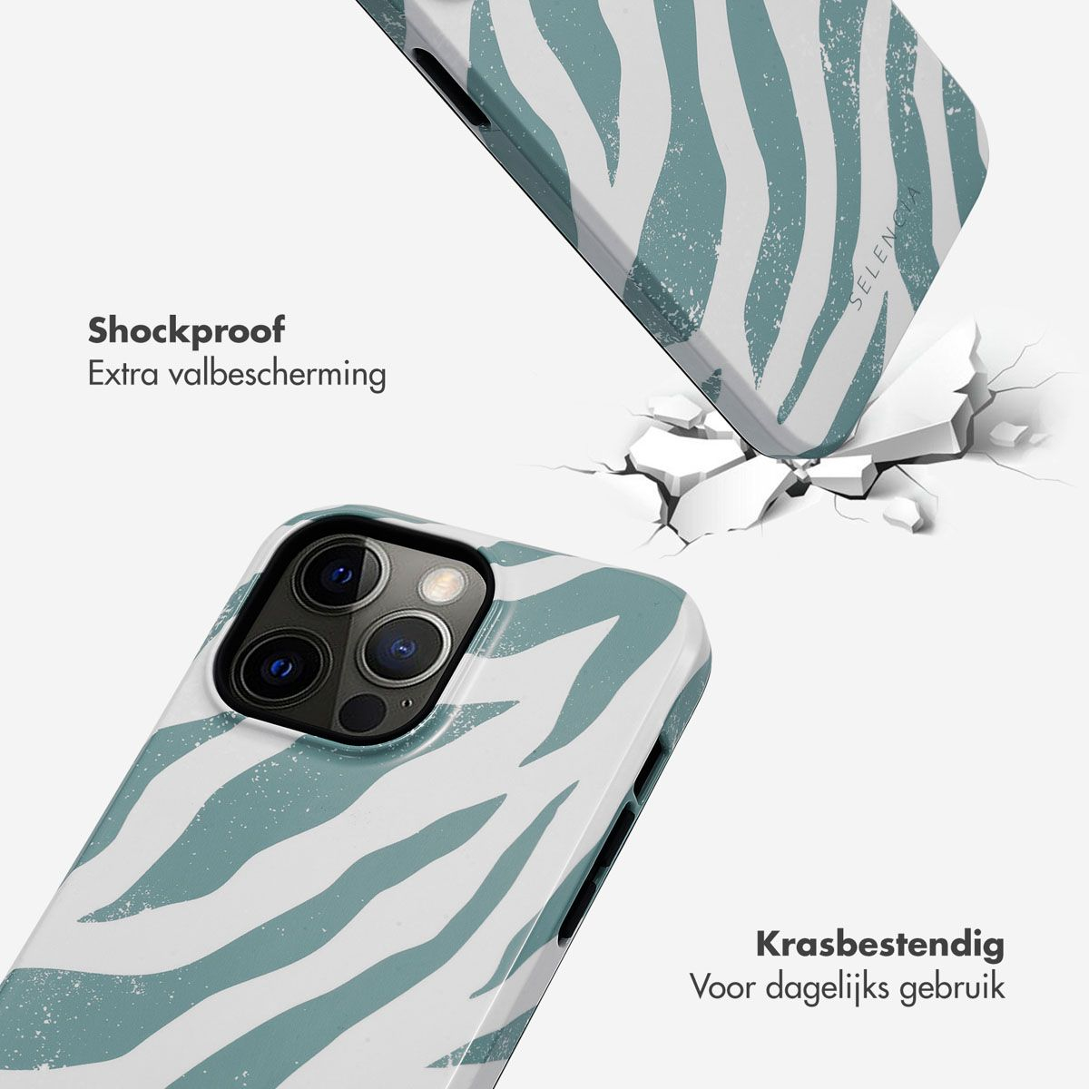 Twee telefoonhoesjes met een zebra-achtig patroon. Eén hoesje valt en breekt een wit oppervlak. Het andere hoesje ligt op de grond.