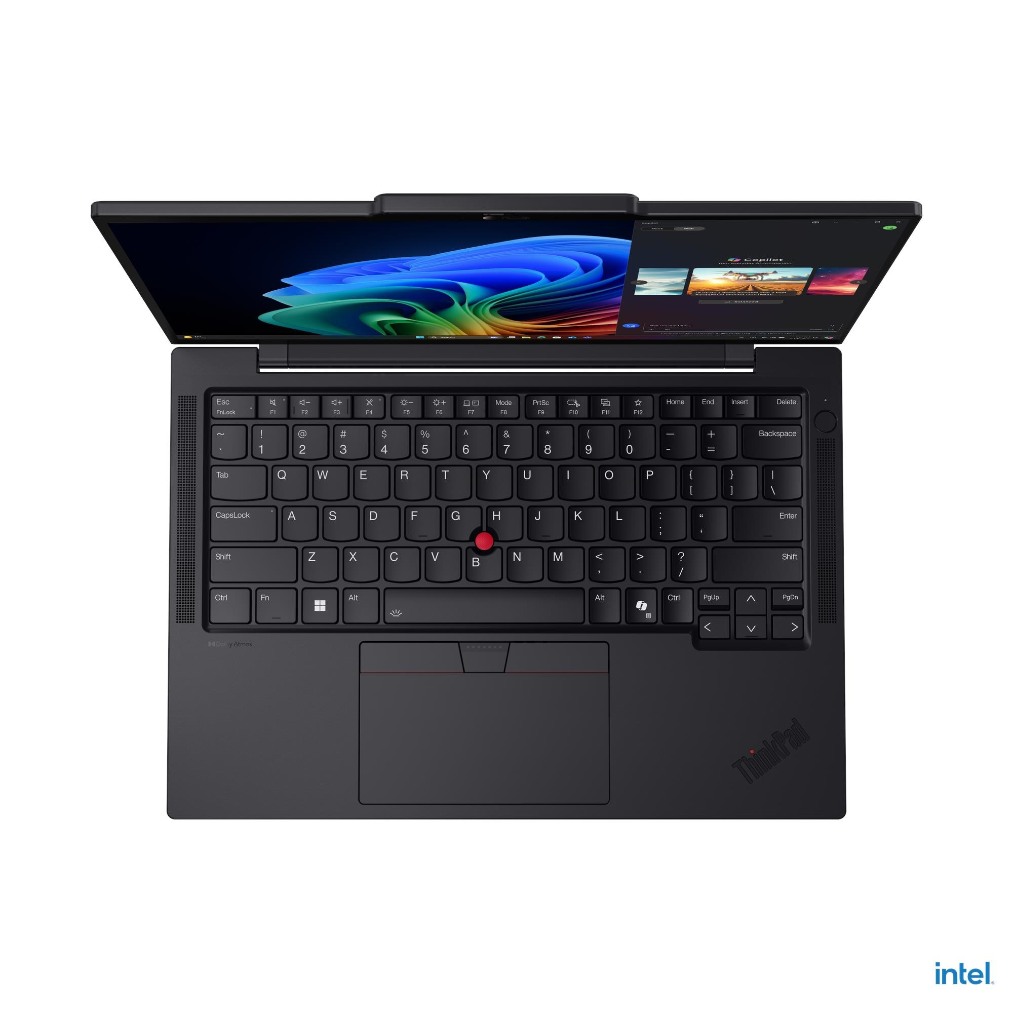 Un laptop nero è aperto, mostrando tastiera e schermo. Lo schermo mostra un'interfaccia colorata. Il logo Intel è in basso.