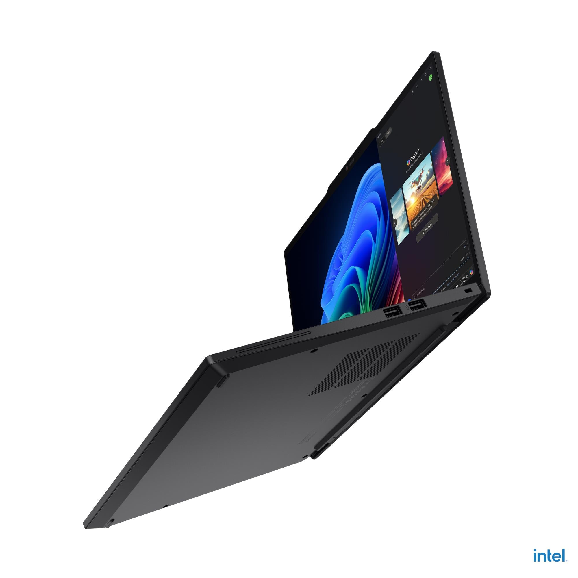 Un laptop nero è aperto, mostrando un'immagine astratta colorata. Il logo Intel è visibile in basso a destra.